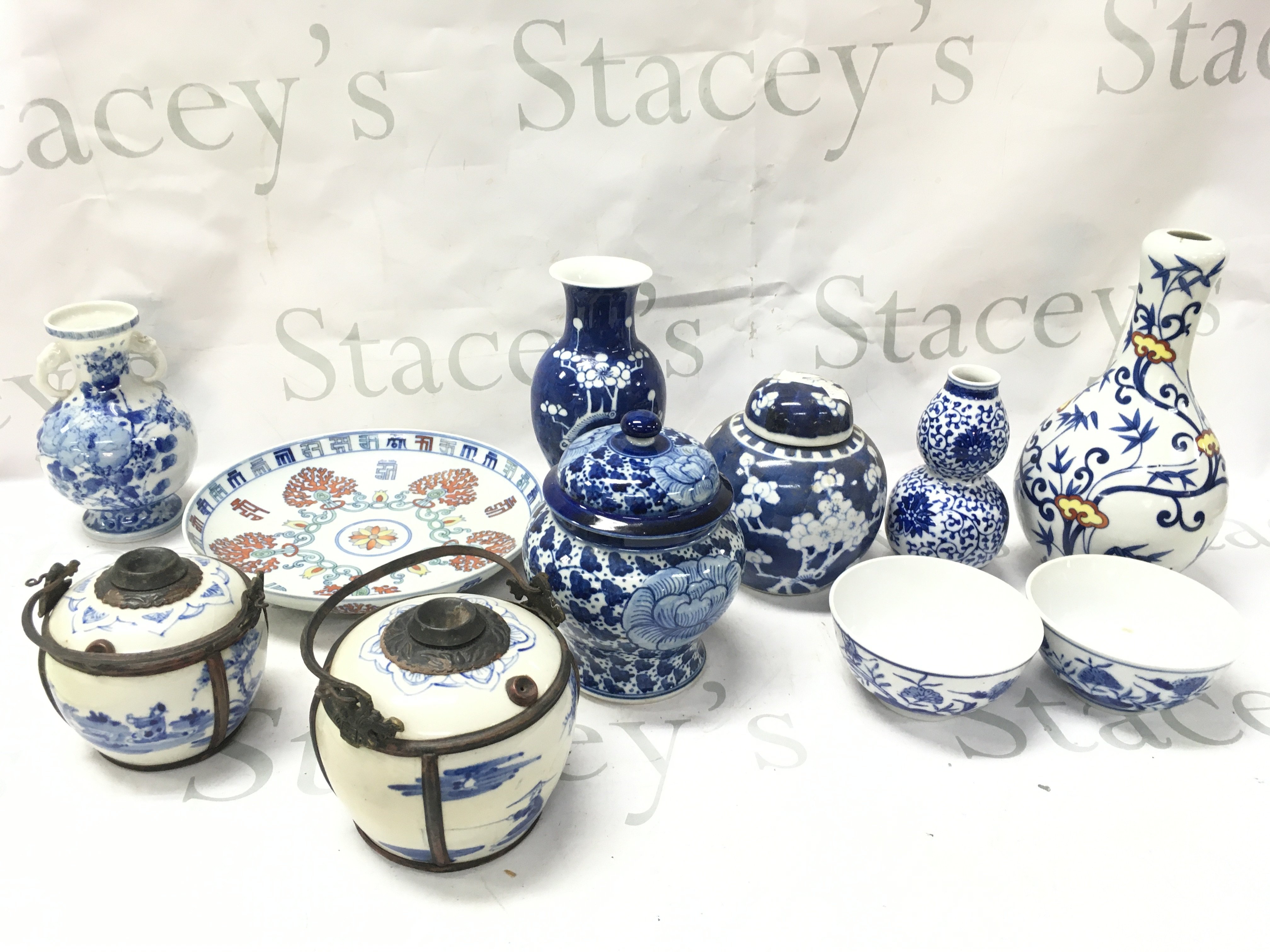 A collection of Chinese blue and white ceramics including a ginger jar, various vases , bowls Etc . This lot cannot be posted