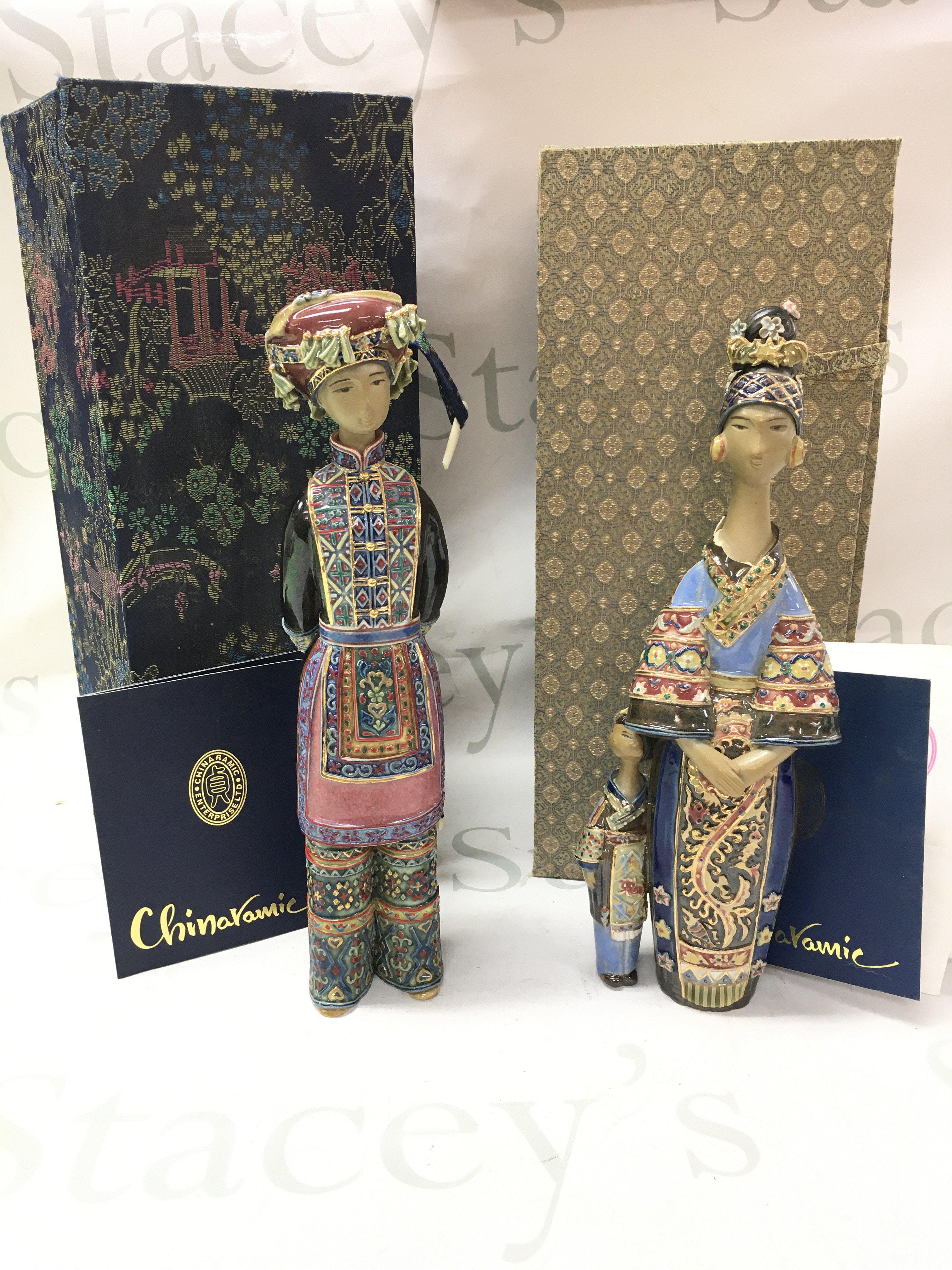 Two boxed porcelain oriental Chinaramic figures . 28cm tall approximately