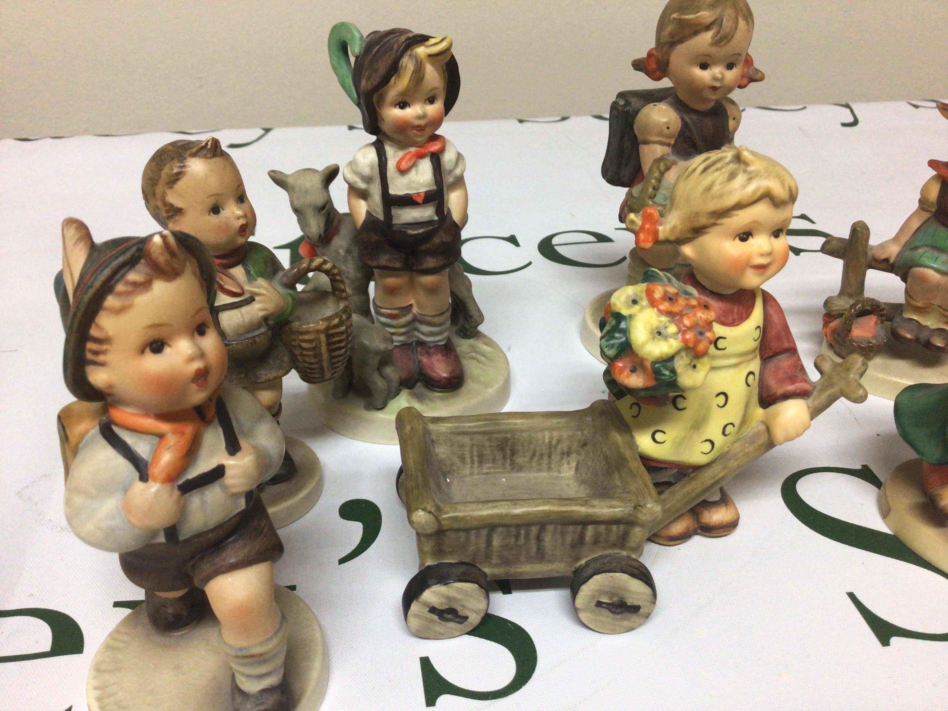 A collection of Goebel Hummel figures. (7)- NO RESERVE