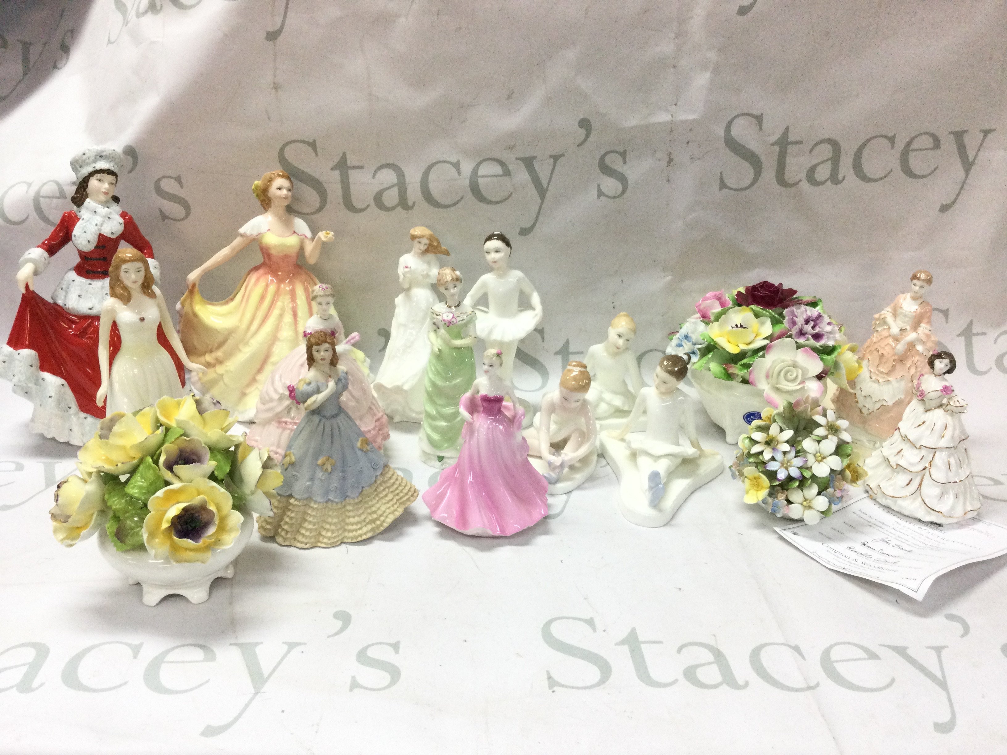 A Collection of ceramic figures including Royal Doulton including figures Winter HN5314, Deborah HN 3644, Pearl Hn4975, Coalport , Wedgwood etc. some boxed.this lot cannot be posted