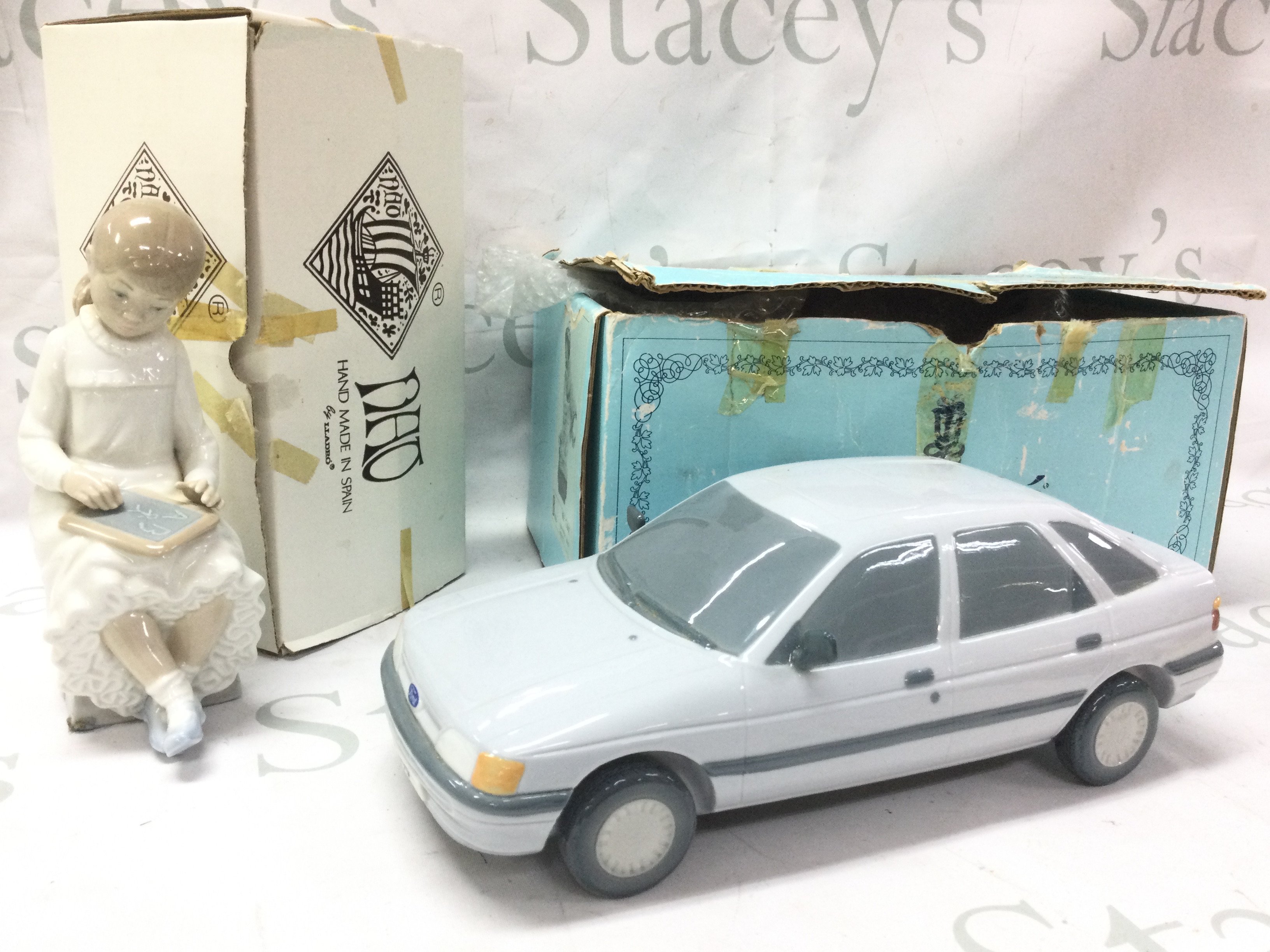 Boxed Lladro 1990 Ford Escort and nao girl with slate figure, this lot cannot be posted