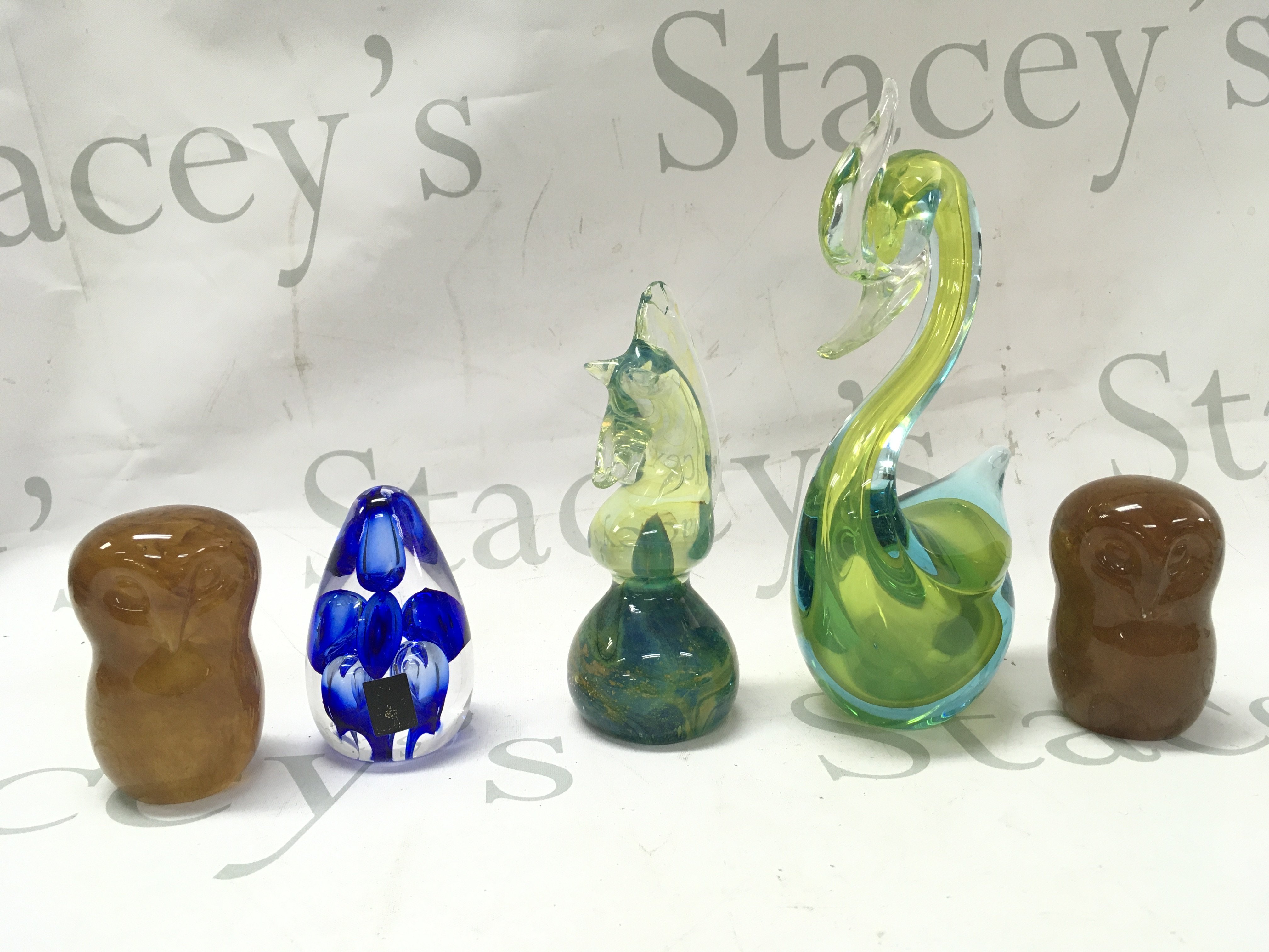 Two glass owl figures 8cm tall . This lot cannot be posted