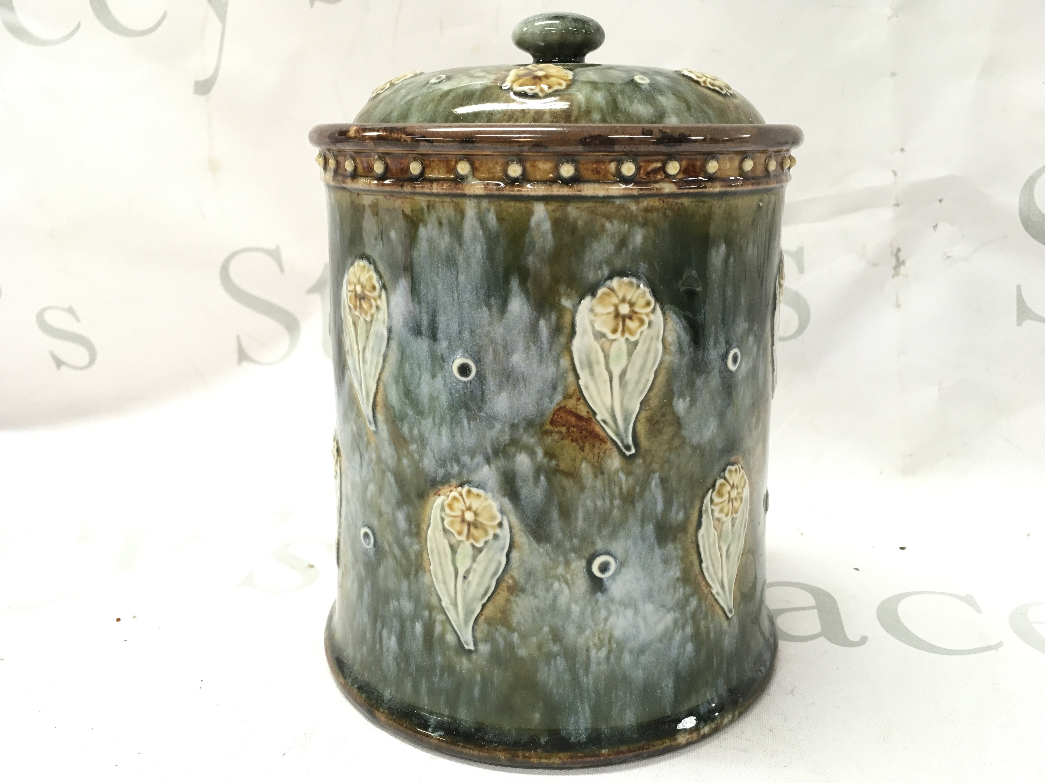Royal Doulton Lambeth pottery caddy , 17cm tall. This lot cannot be posted