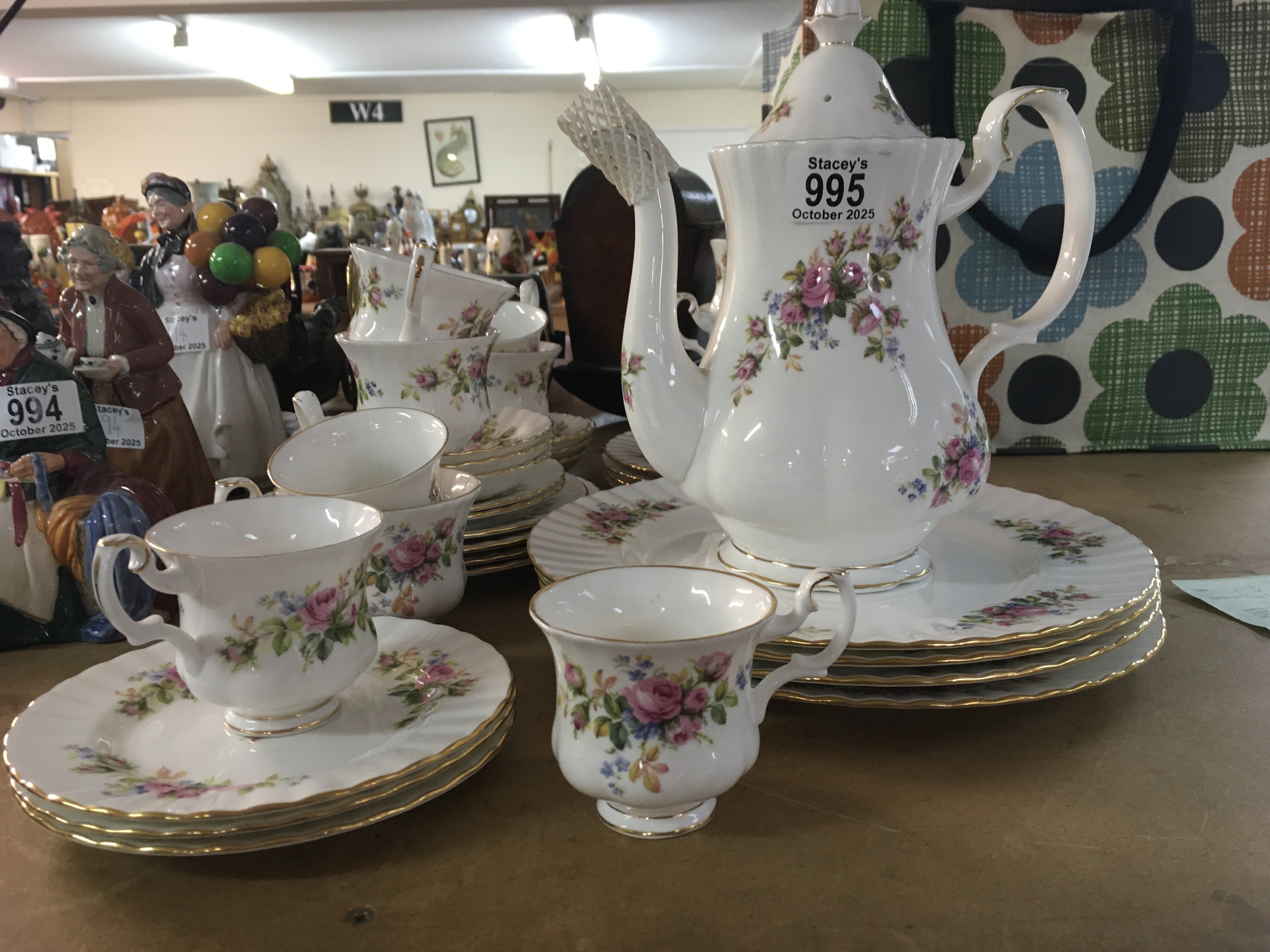 A Royal Albert Moss Rose coffee set decorated with flowers and flowers.
