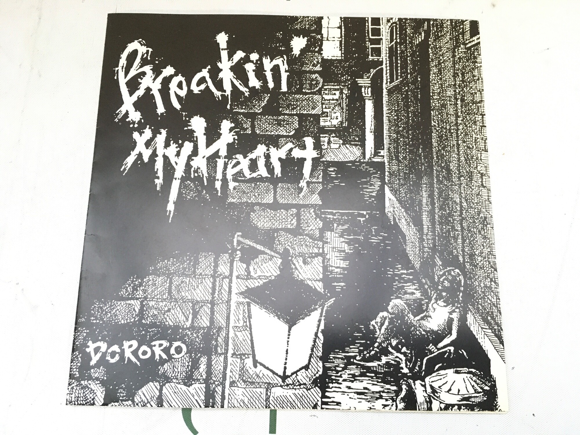 A 1985 split 7" self released flexi disc from the Japanese hardcore punk bands The Prisoner and Dororo in 1985.