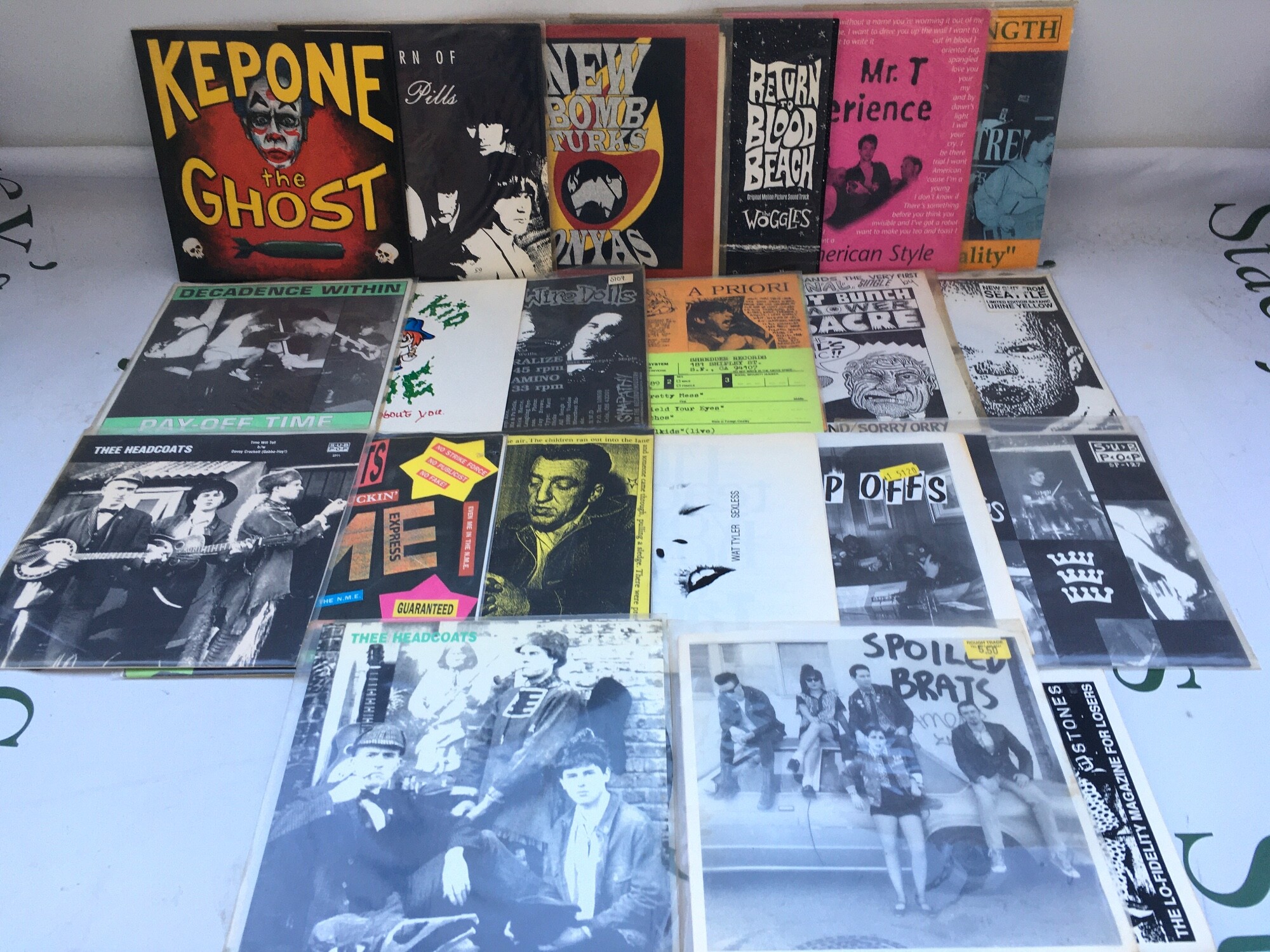20 grunge, punk and alt rock 7" singles by various artists including Spoiled Brats, Thee Headcoats, New Bomb Turks and others.