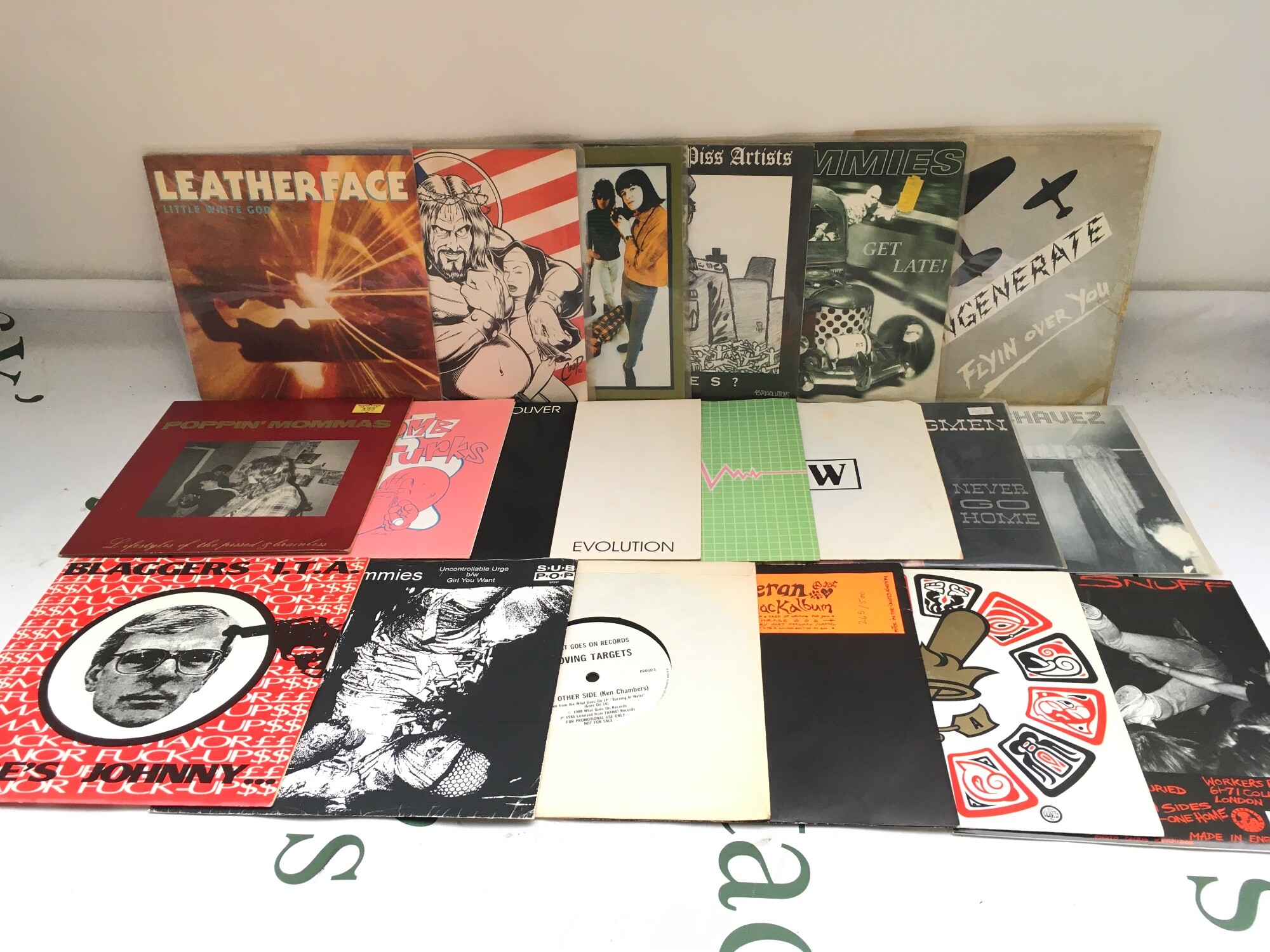 20 grunge, punk and alt rock 7" singles by various artists including Leatherface, Redd Kross, New Bomb Turks and others.