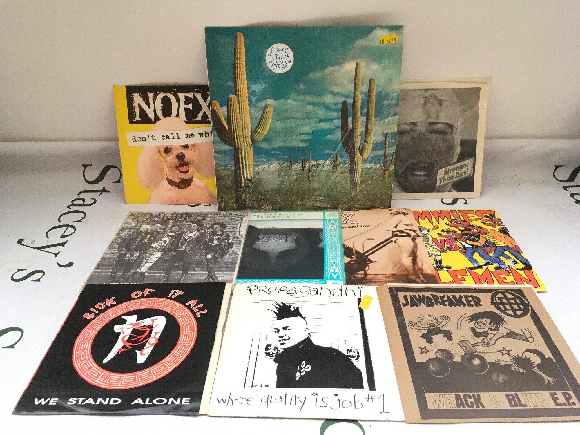 A small collection of grunge, punk and alt rock records comprising mainly 7" singles by The Mummies, NOFX and others plus a Rocket From The Crypt six track 10" record.