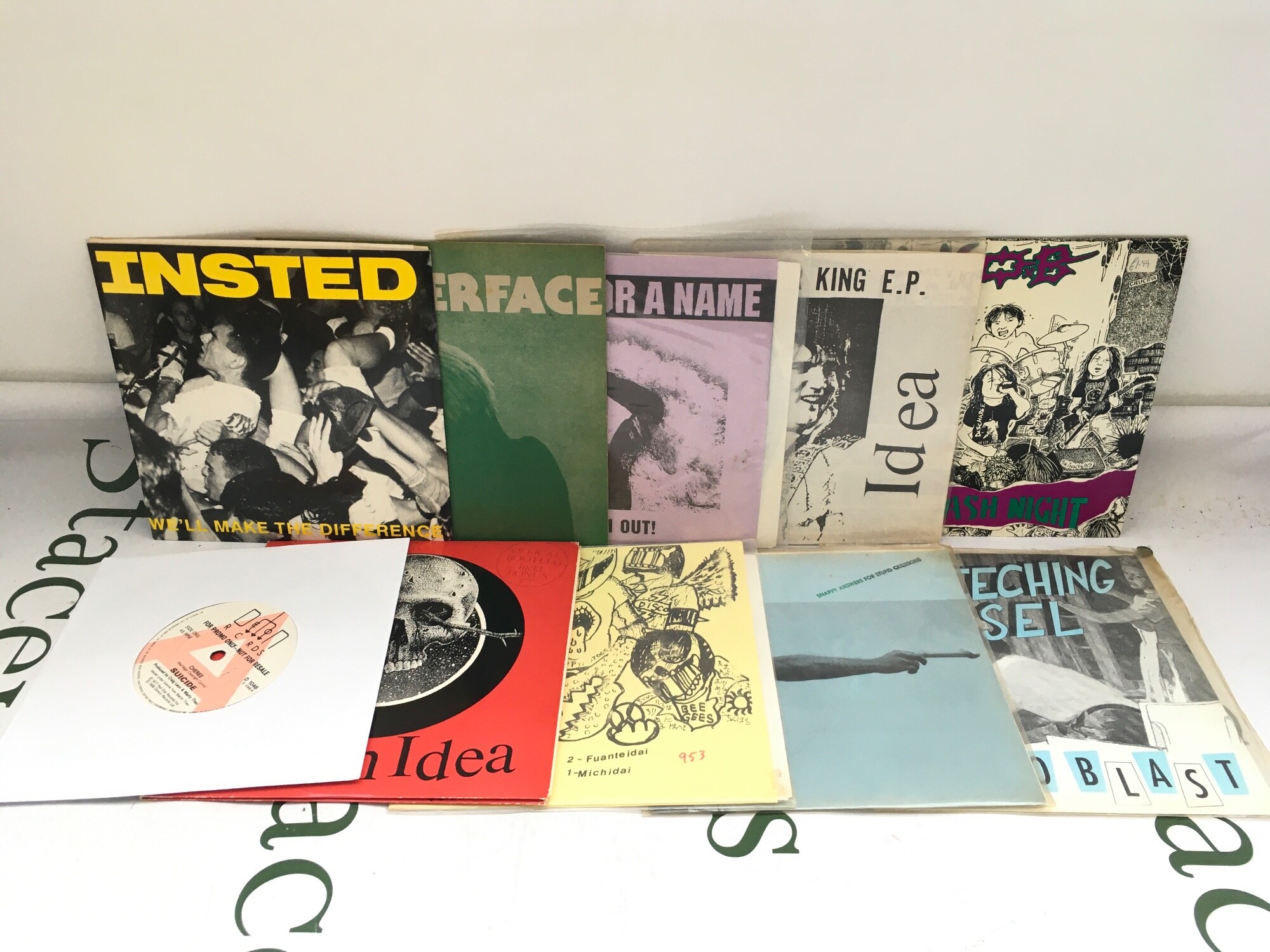 Ten grunge, punk and hardcore 7" singles and EPs by various artists including a Suicide promo disc, Sob, Leatherface and others.
