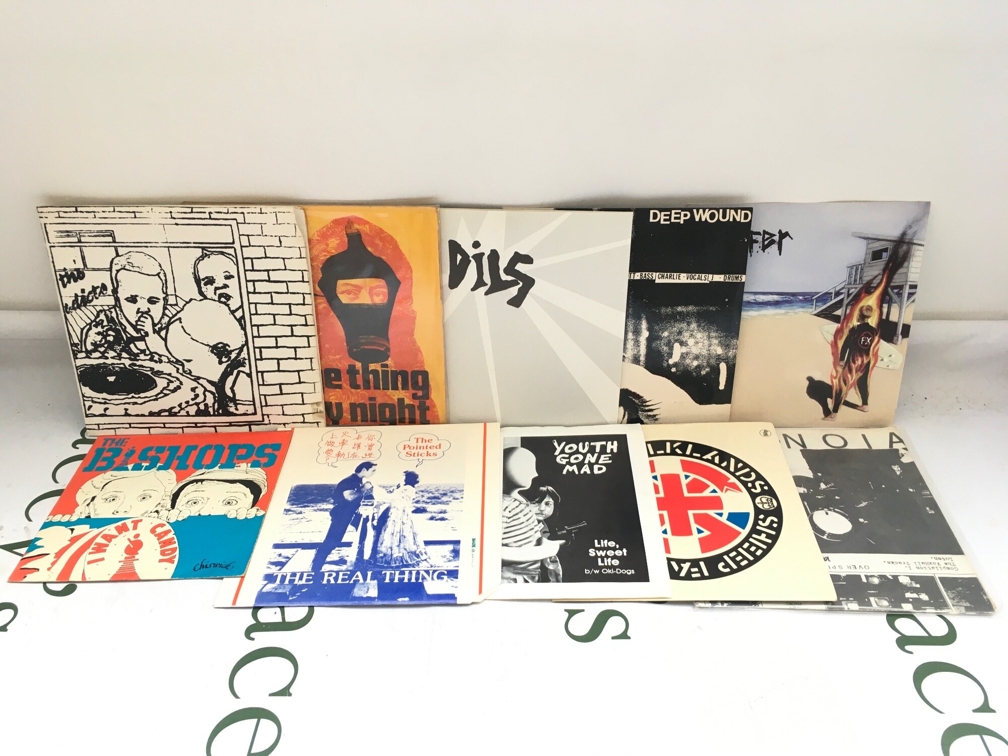 Ten punk and hardcore 7" singles by various artists including The Adicts, Victim, Pointed Sticks and others.
