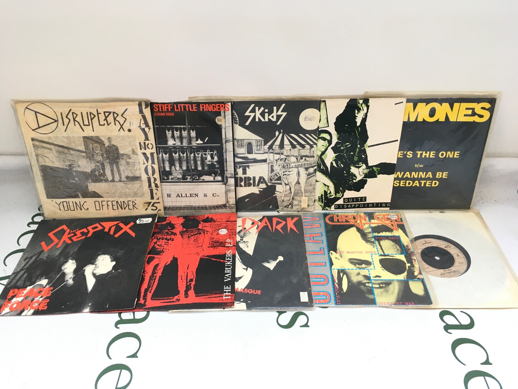 Ten punk rock 7" singles by various artists including New York Dolls, Ramones, 999 and others.