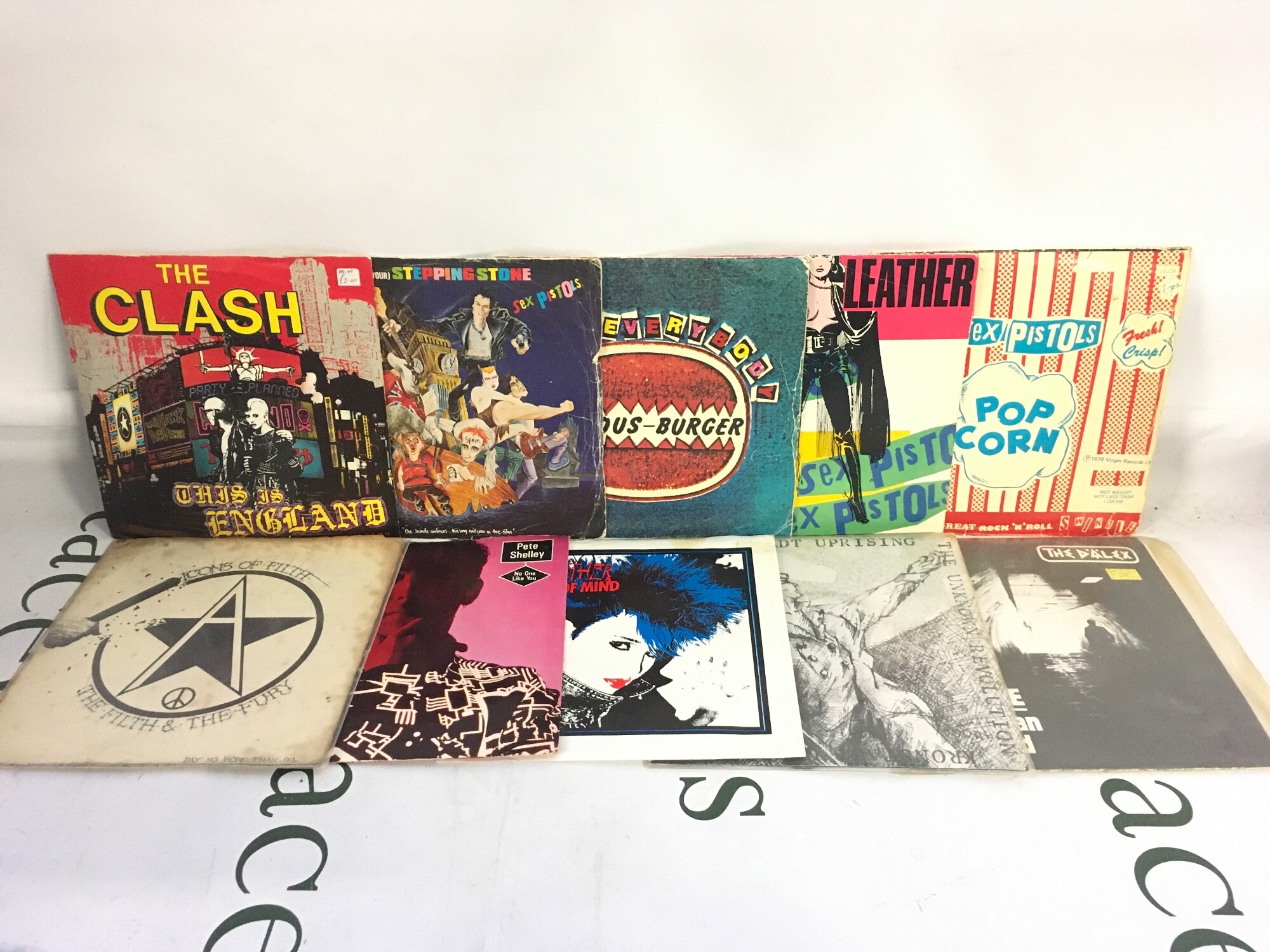 Twenty punk 7" singles by various artists including Sex Pistols, The Dalex, The Damned and others.