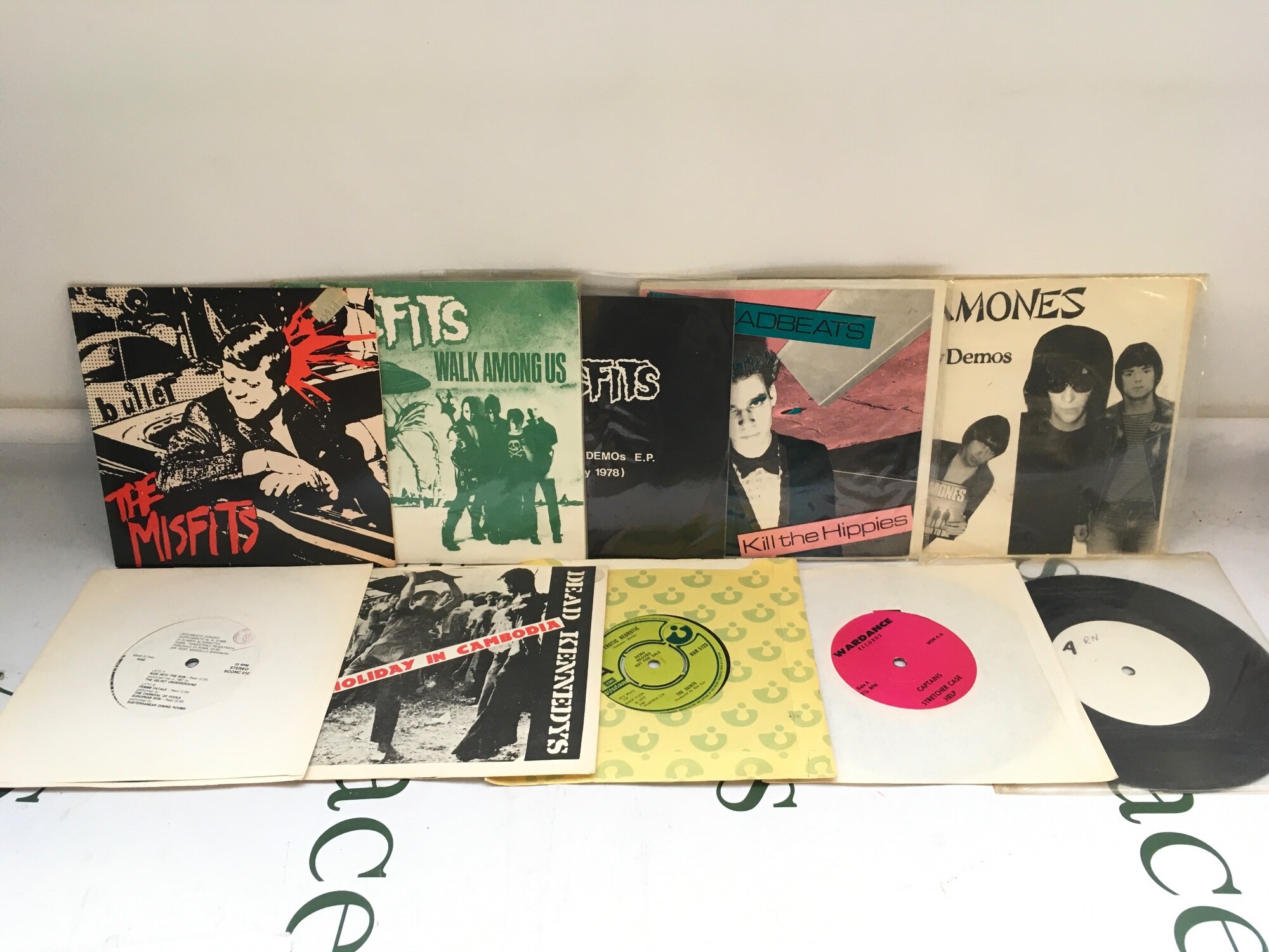 Ten 7" singles and EPs by various artists including a demo disc by The Saints plus other releases by The Ramones, The Misfits and others.