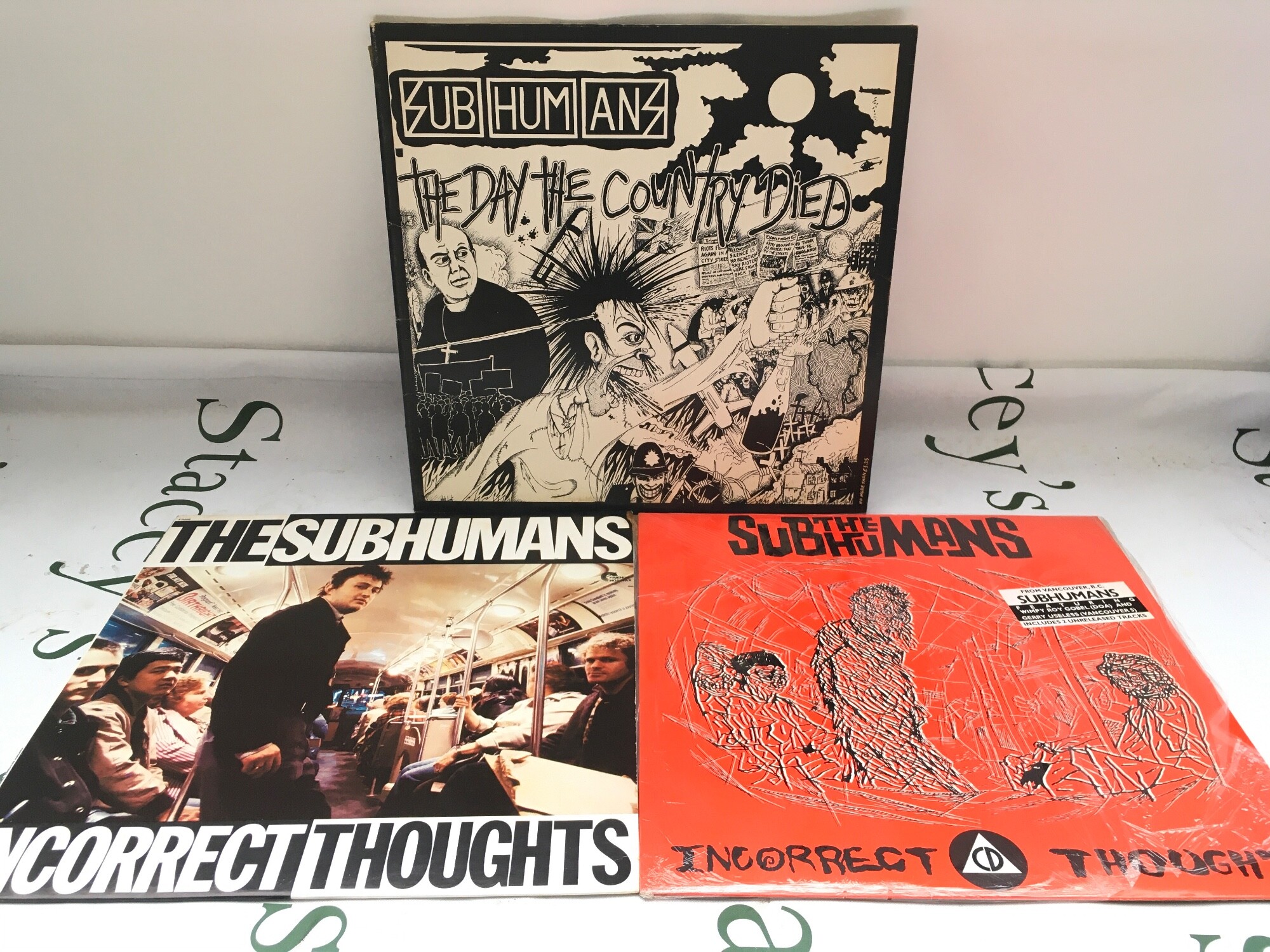 Three LPS by The Subhumans comprising the original 1980 release and 1985 reissue of Incorrect Thoughts plus The Day The Country Died.