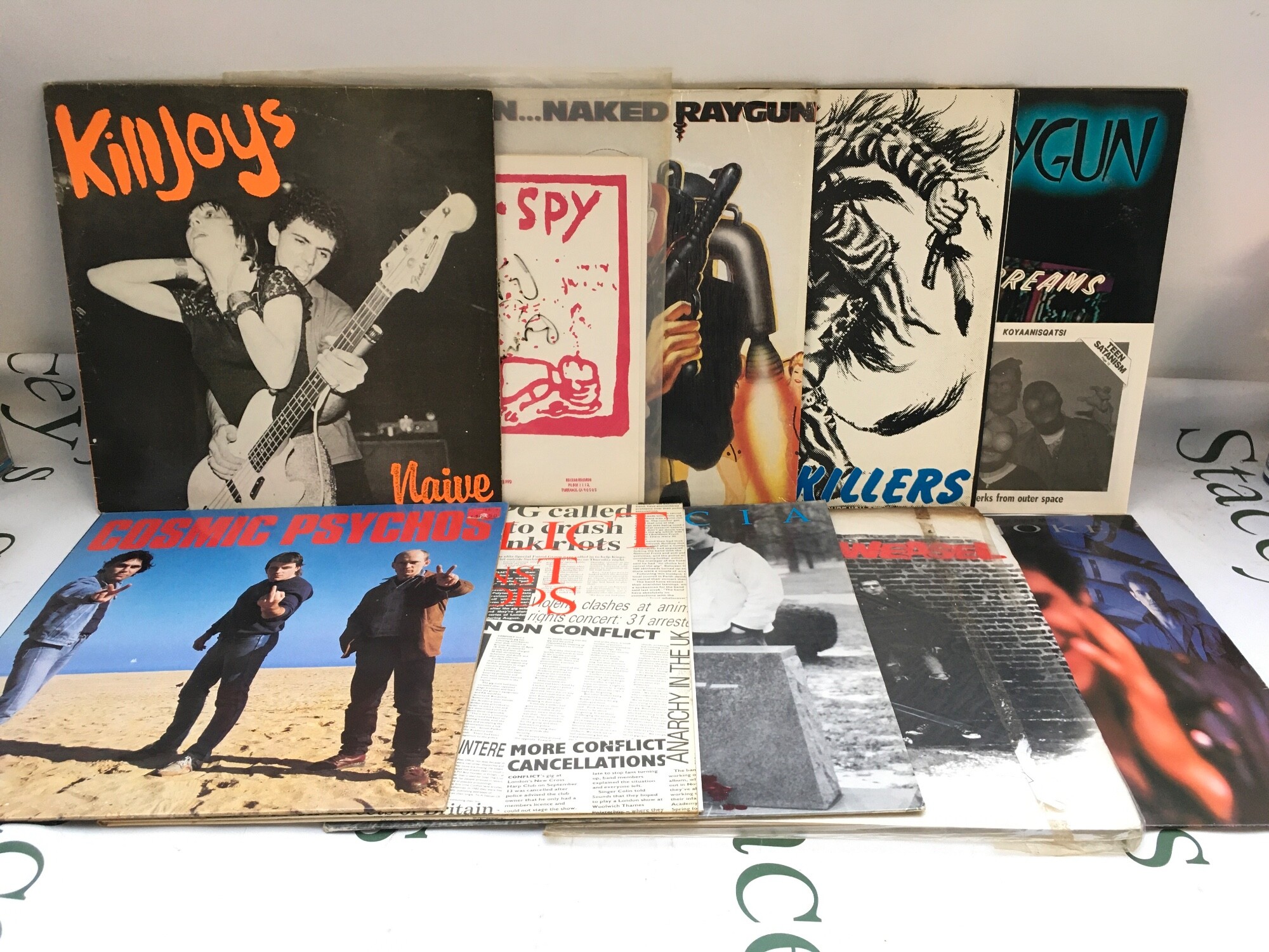 Ten punk and alternative rock LPs by various artists including Naked Raygun, Killing Joke, Cosmic Psychos and others.