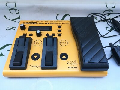A Boss GP-10 guitar processor pedal with PSU plus  a Roland GKP-4 parallel box and Roland GK-2A (3).