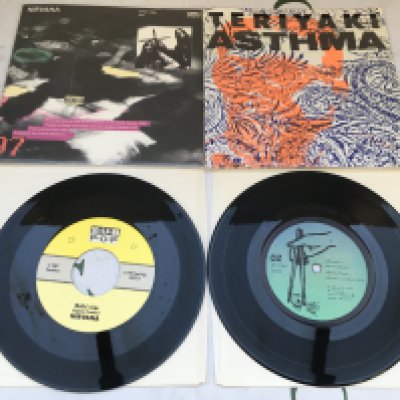 A limited edition Sub Pop singles club 7" single of Molly's Lips by Nirvana / Candy by The Fluid plus a 1989 four track compilation EP Teriyaki Asthma featuring Nirvana, Helios Creed, Yeast and Coffin Break. Both EX/EX.