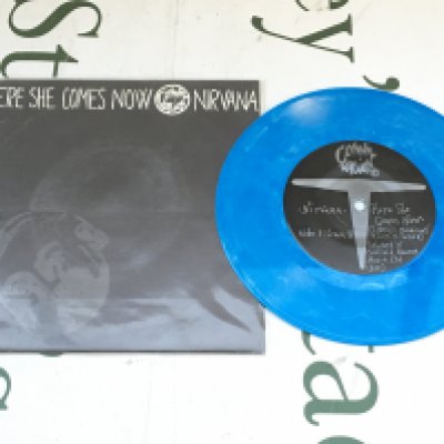 A limited edition split 7" single on blue marbled vinyl featuring Here She Comes Now by Nirvana and Venus In Furs by Melvins. Believed to be one of  only 1000 copies distributed worldwide. EX/EX. 