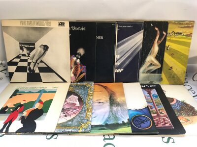Twelve prog rock / ambient LPs by various artists including Brian Eno, Terry Riley, Genesis and others. Includes a signed Gryphon LP.