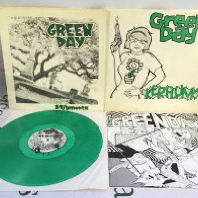 Two first US pressings of early Green Day LPs comprising a sealed Kerplunk! and a green vinyl pressing of 39/Smooth complete with insert. Mint/EX.
