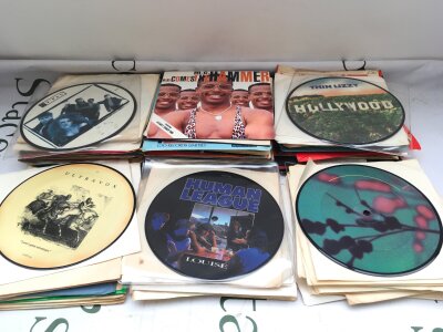 A collection of 7" singles including picture discs by various artists including Ultravox, Thin Lizzy, OMD and many more.
