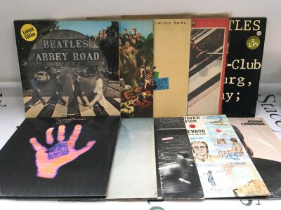 Ten Beatles and solo LPs comprising an Abbey Road picture disc, Living In The Material World, Imagine and others.