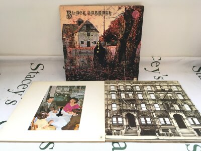 A second UK pressing of the debut Black Sabbath LP plus two early UK Led Zeppelin LPs comprising Presence and Physical Graffiti.