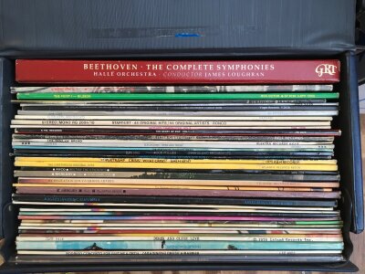 Three record cases of LPs by various artists including Bob Dylan, ELO, Elton In and others.