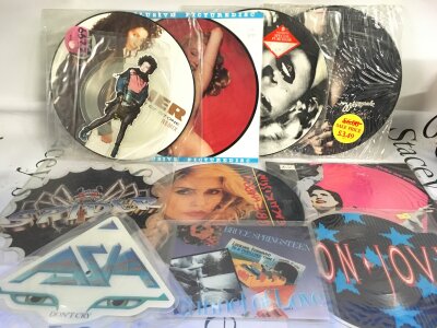 A collection of picture discs and 10" records by various artists including Talking Heads, Bruce Springsteen, Bon Jovi and many more.