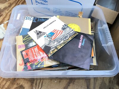 A collection of 7" singles by various artists including Pink Floyd, Depeche Mode, Bon Jovi and others.