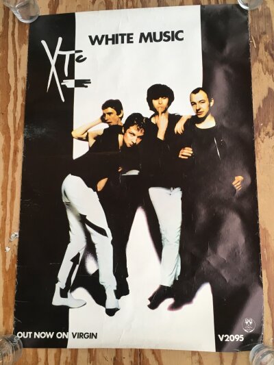 Five music posters for various artists comprising XTC, Blondie, Ultravox and The Pretenders.
