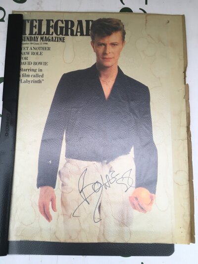 A signed David Bowie magazine cover, no COA.