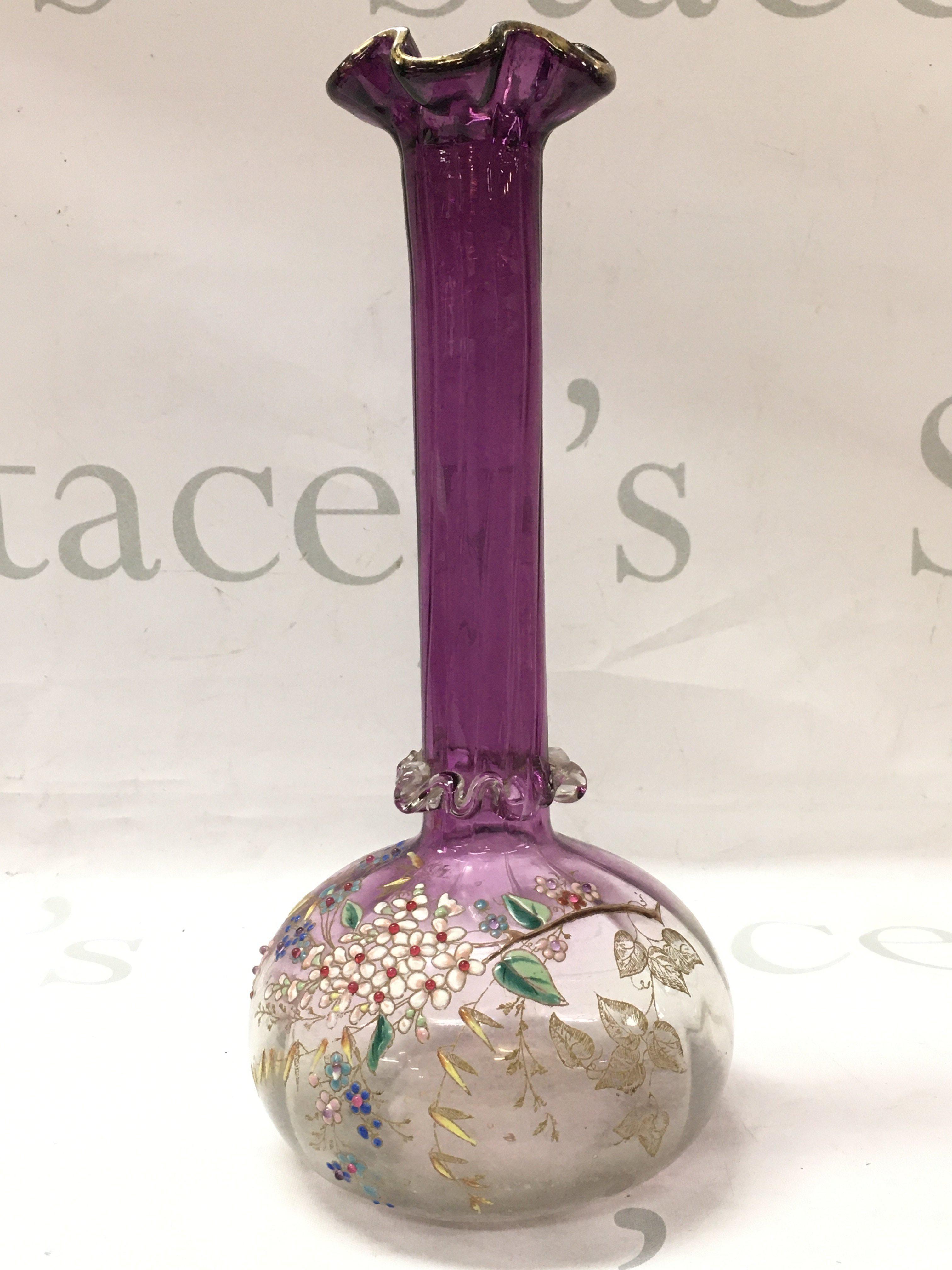 A Victorian glass vase with later enamel and gilt applied decorated , 25cm tall. This lot cannot be posted