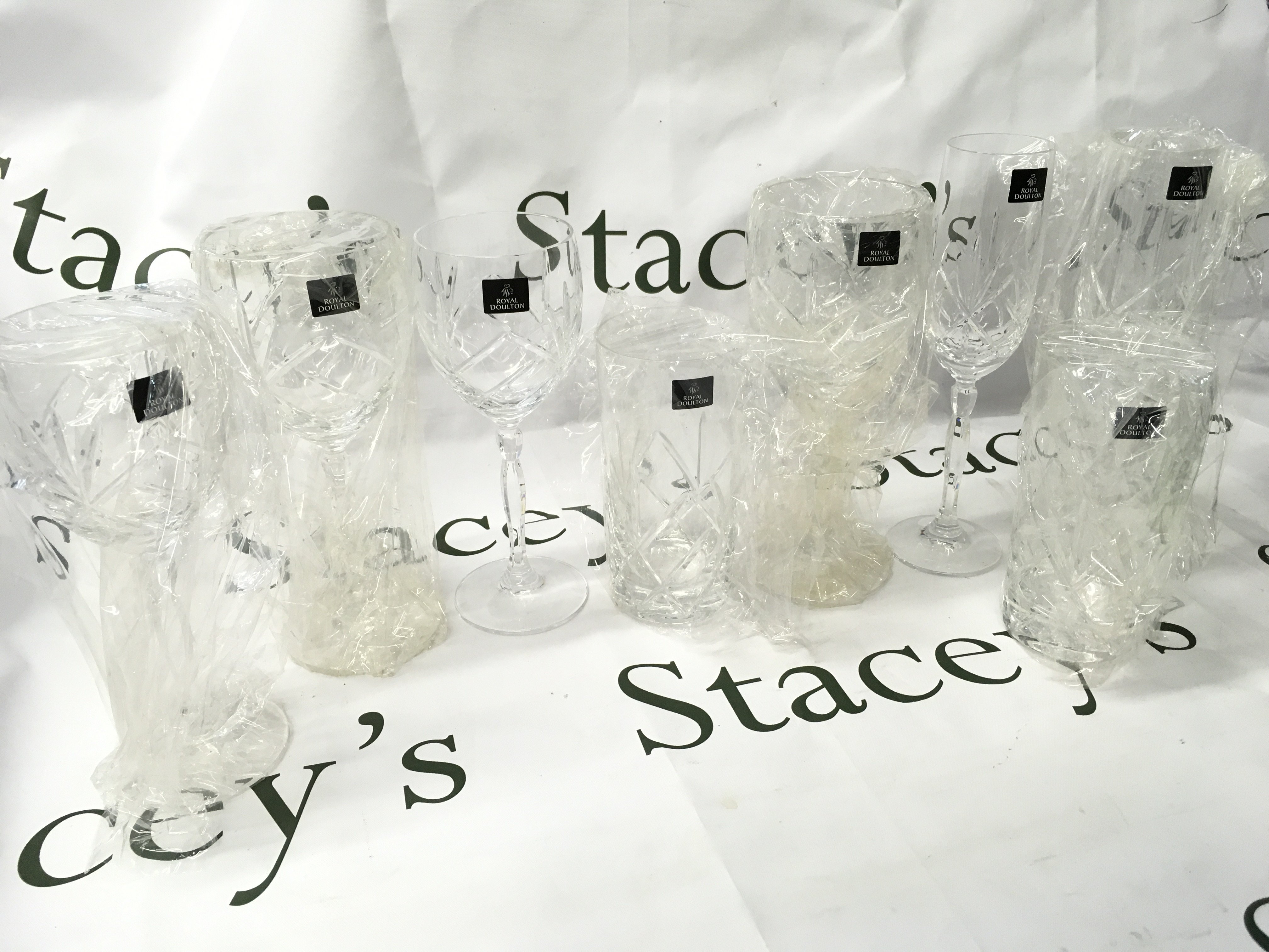 Boxed Royal Doulton lead crystal glasses , 8 piece set as new . This lot cannot be posted