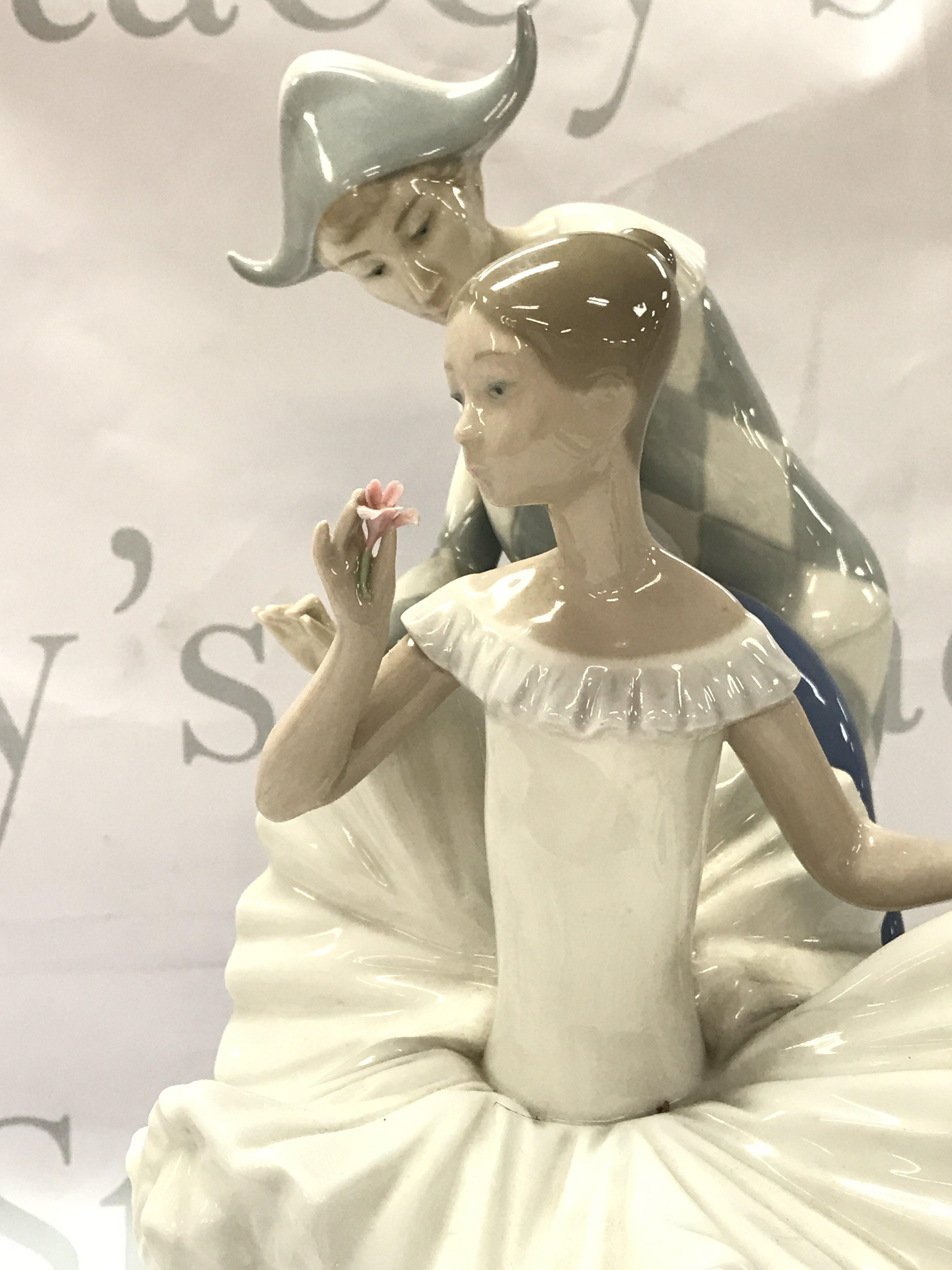 A Nao porcelain figure group, a Dream come true . 30cm tall. This lot cannot be posted.NO RESERVE