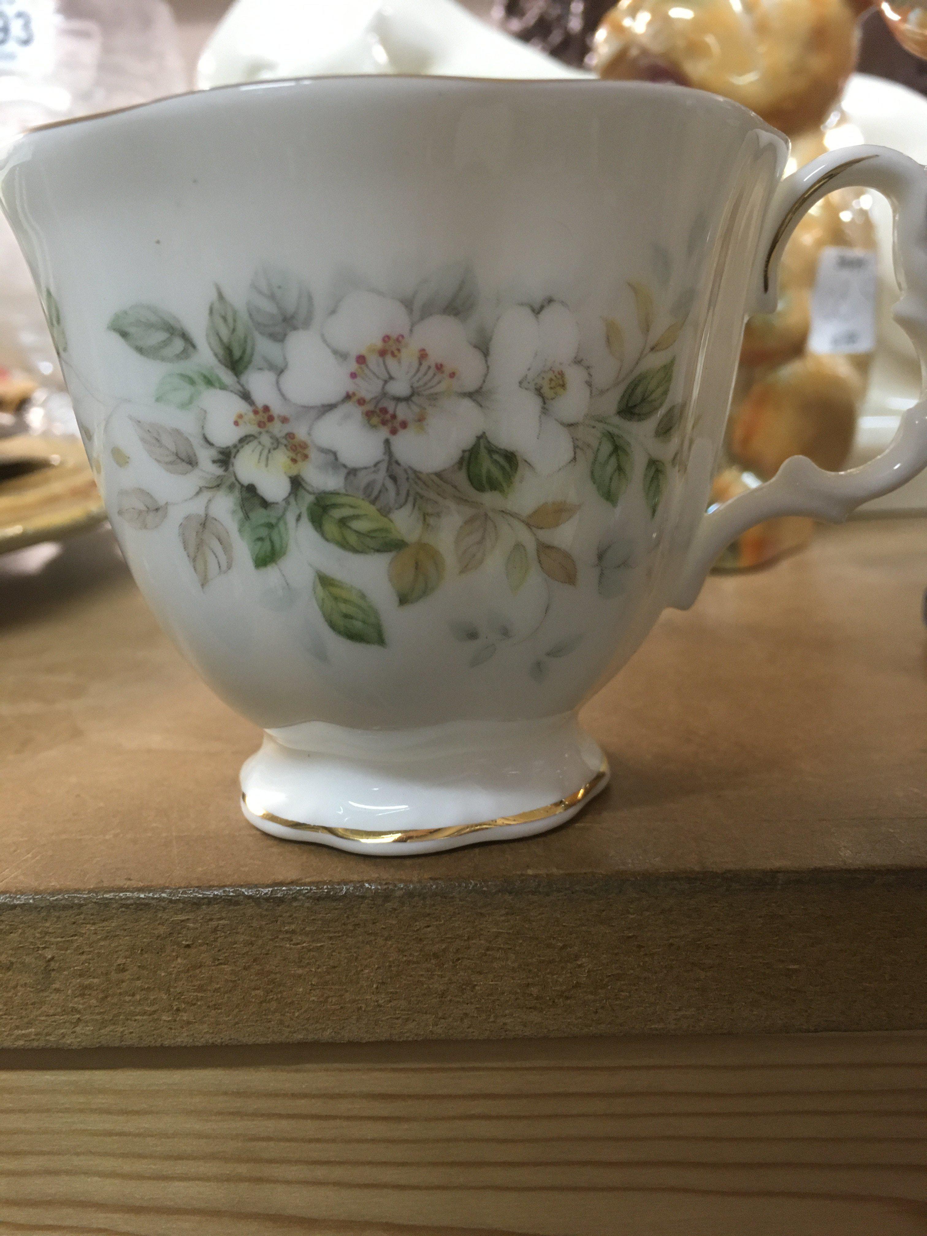 A Boxed Royal Albert Haworth tea set . Six cups saucers side plates ,