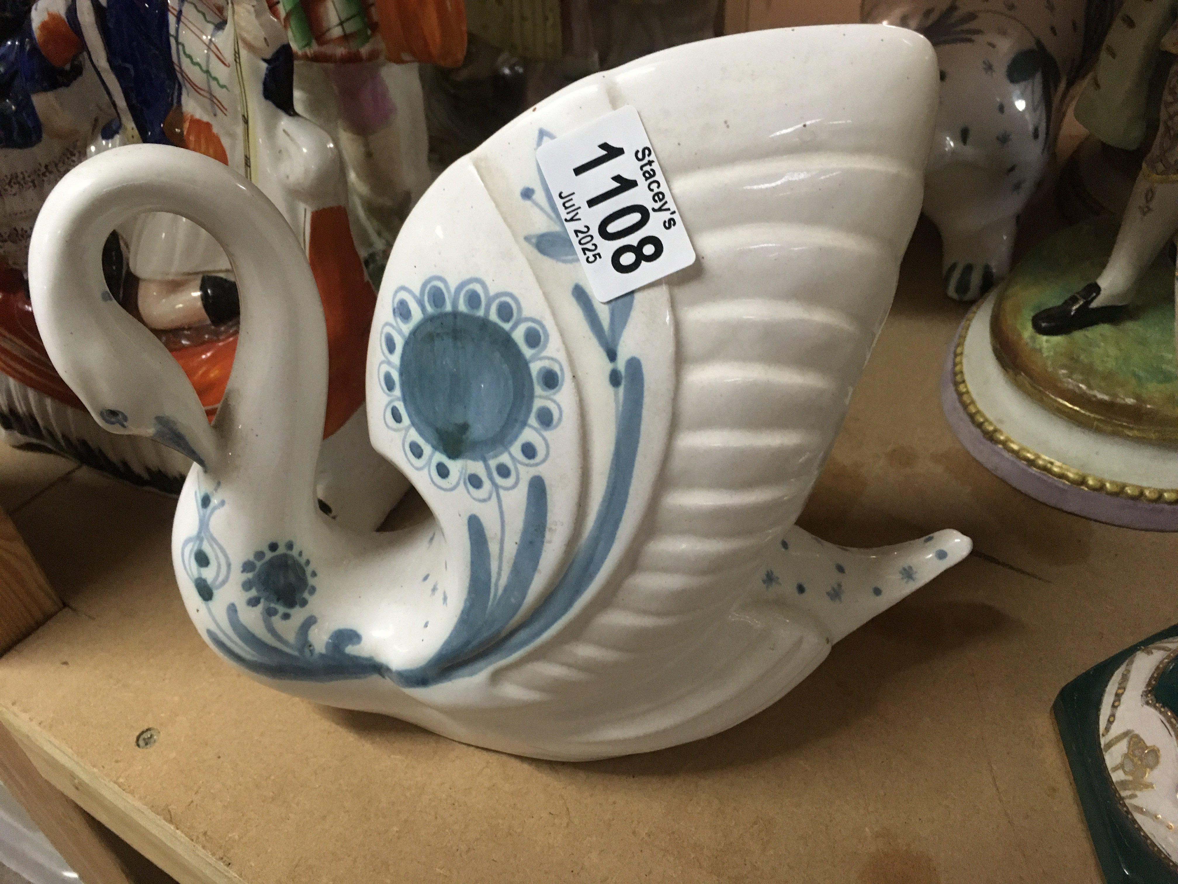 Two Rye figures in the form of a swan and a badger.