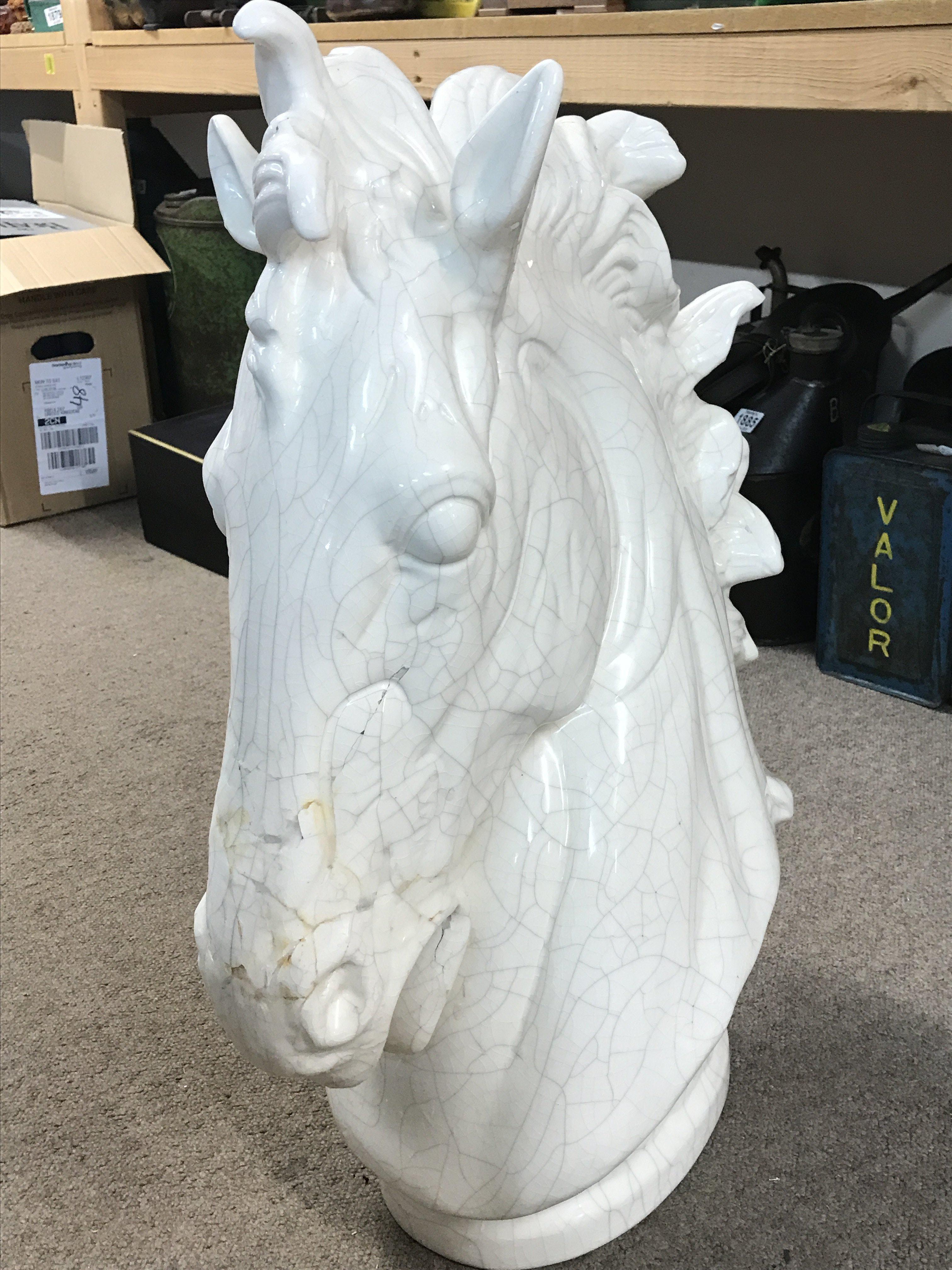 A ceramic horse head sculpture, possibly Italian. with some damage .67cm tall . This lot cannot be posted