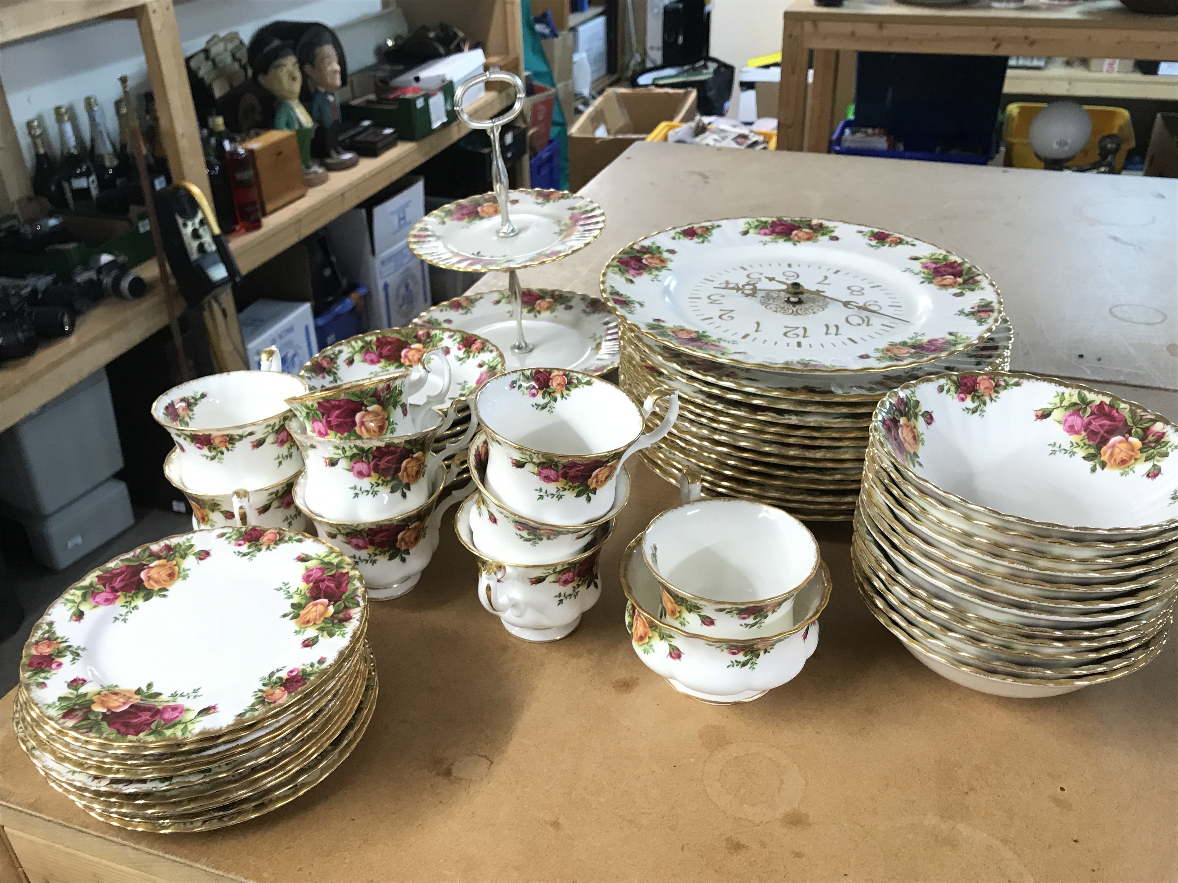 A Royal Albert old country roses tea set including saucers, cups, plates etc . This lot cannot be posted