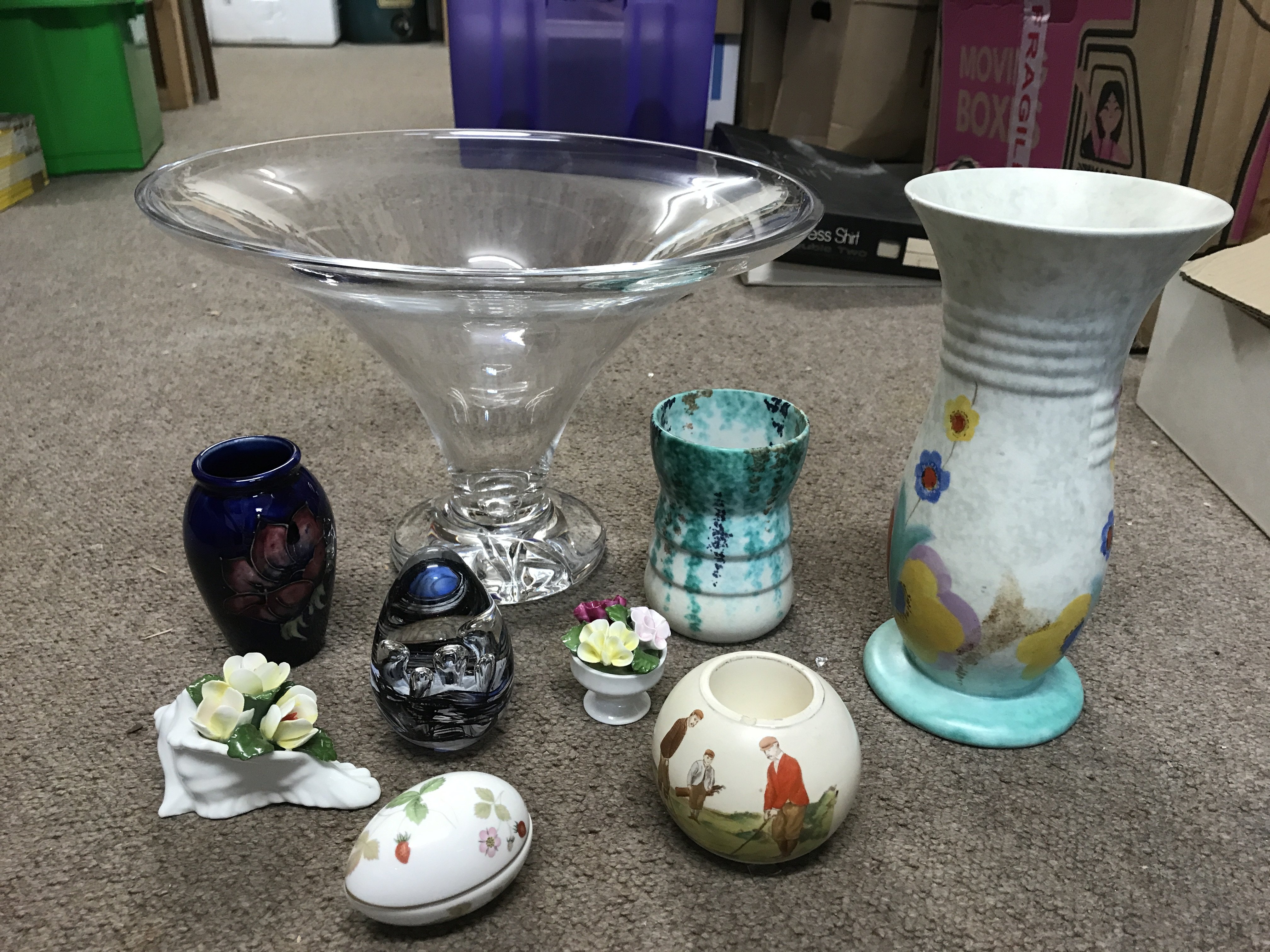 Ceramics including a large Waterford glass vase, Beswick vase and a smaller example, Carltonware, Wedgwood, small Moorcroft vase, paperweight, Aynsley floral ceramics. This lot cannot be posted