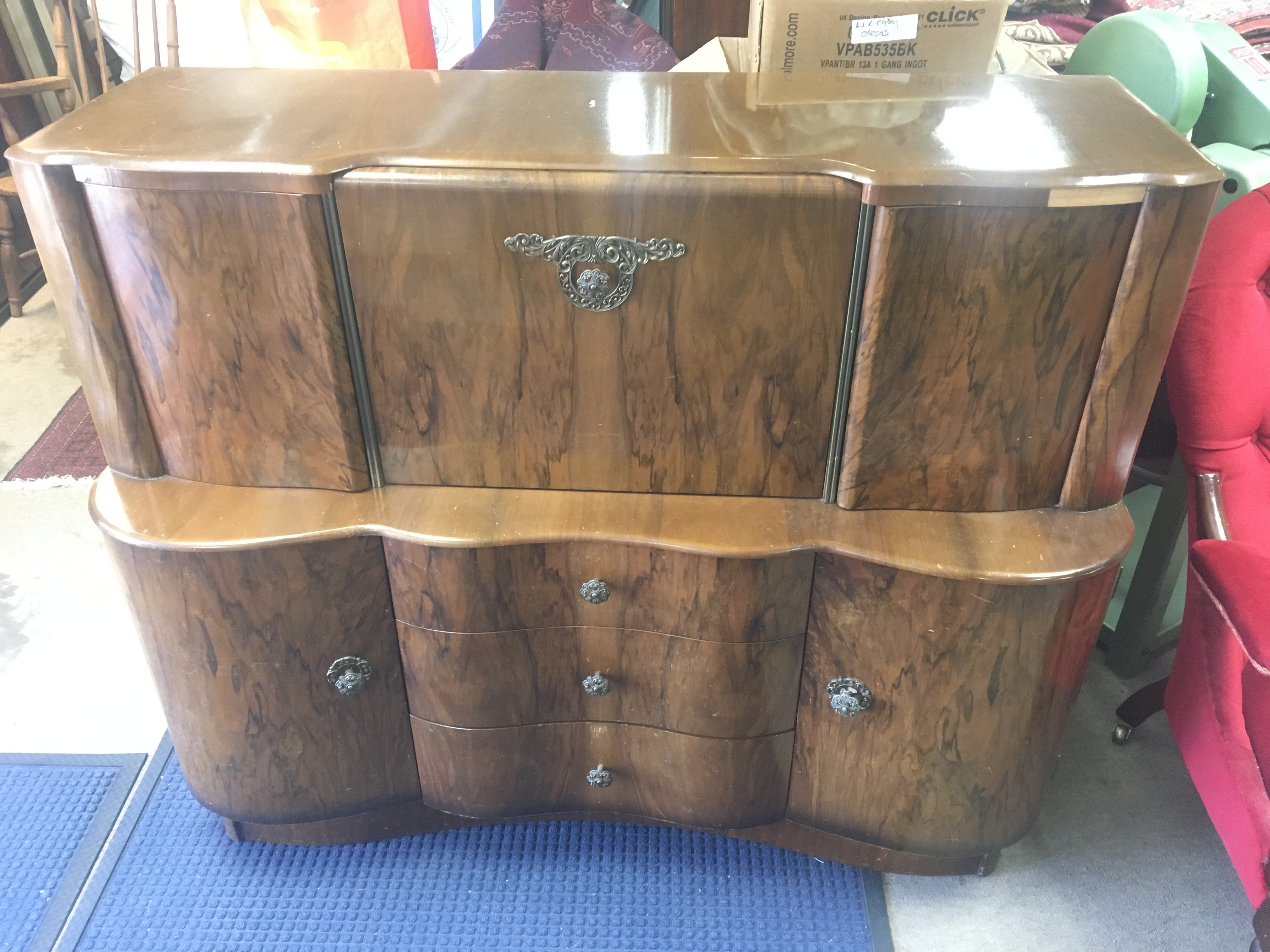 A walnut cocktail cabinet. 130cm wide 50cm deep and 108cm tall.