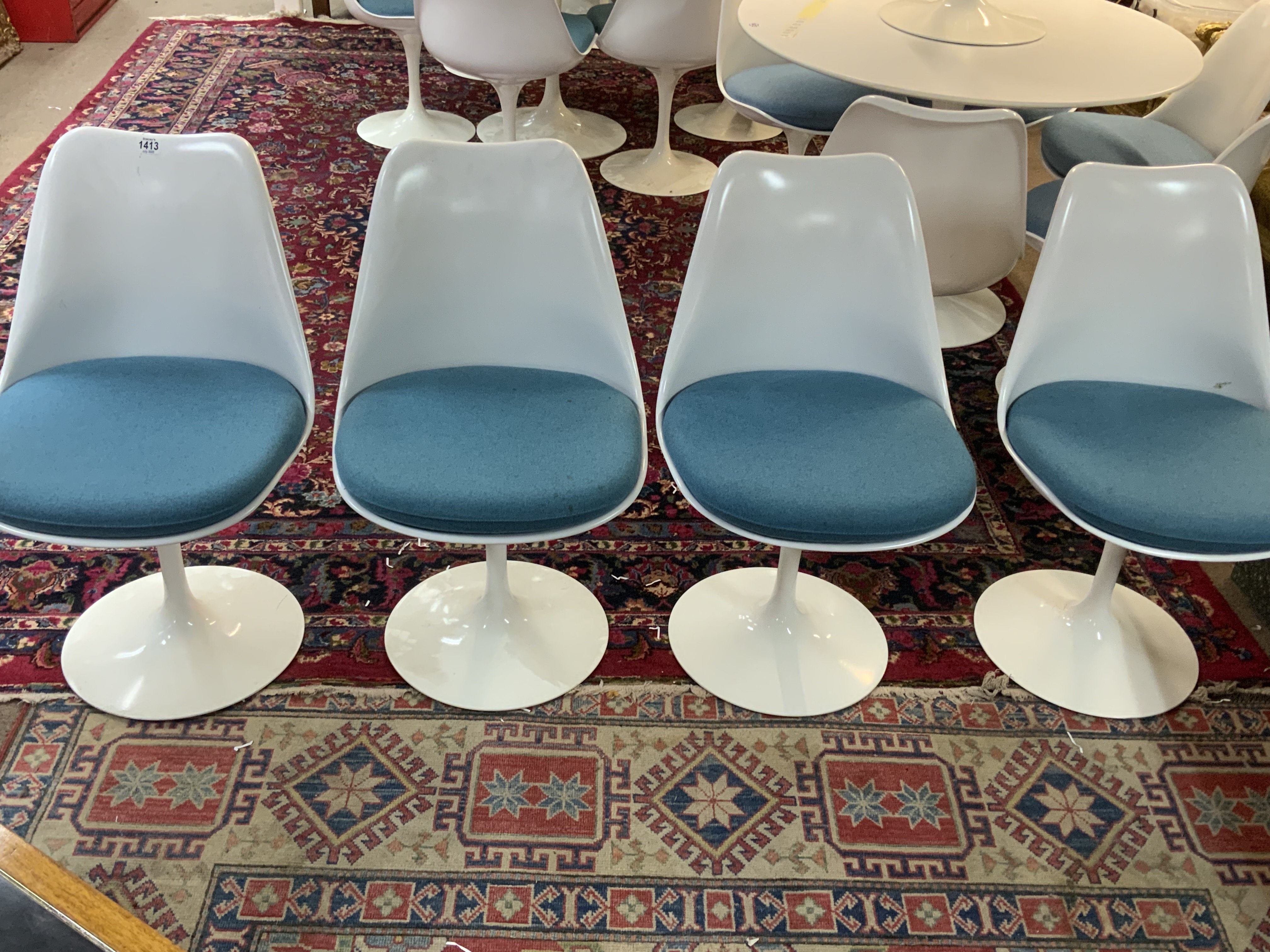 6 Tulip chairs designed by Eero Saarinen 1956 (Finnish-American, 1910-1961) for Knoll Studio 1956, 4 with cushions/ 2 without cushions / 2 107cm Diameter table tops without bases.