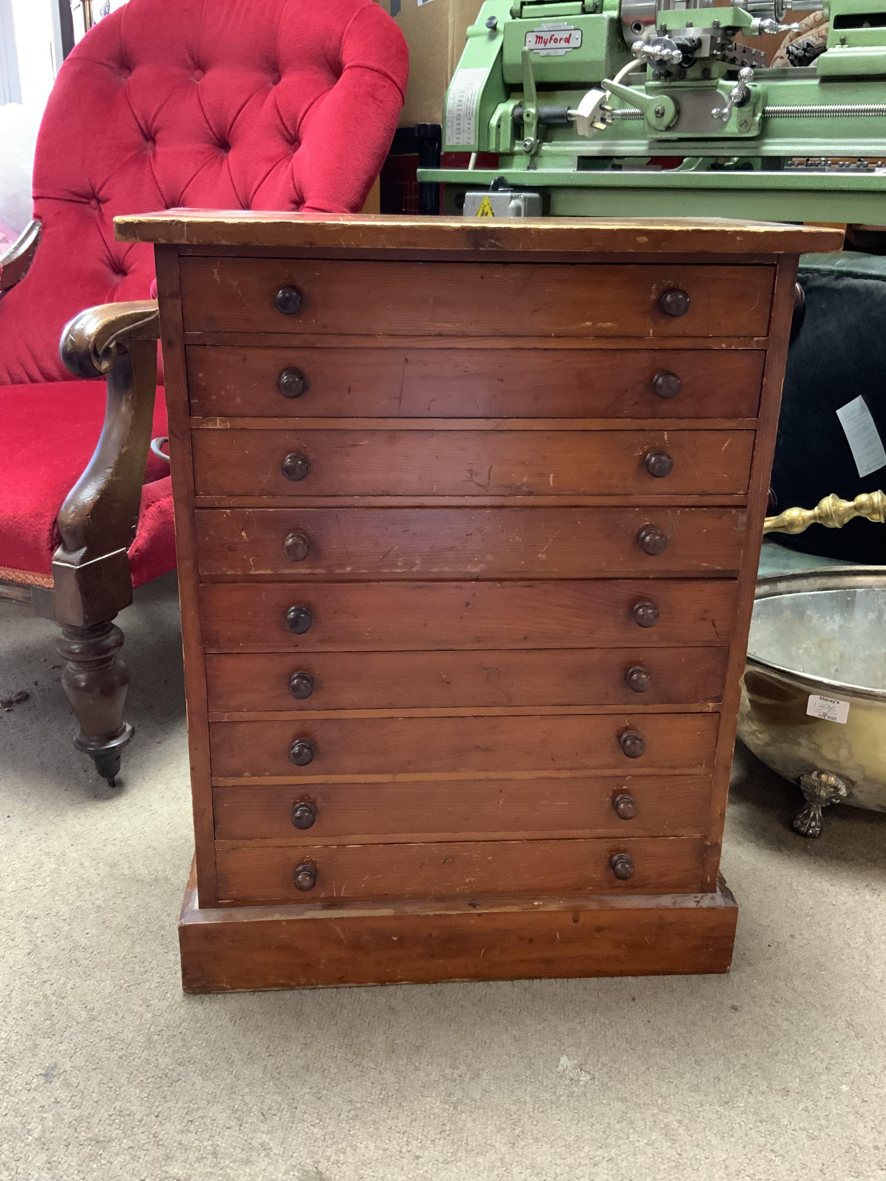 A small 9 drawer collectors chest, each draw with a glazed cover. 63cm x 29cm x 49.5cm