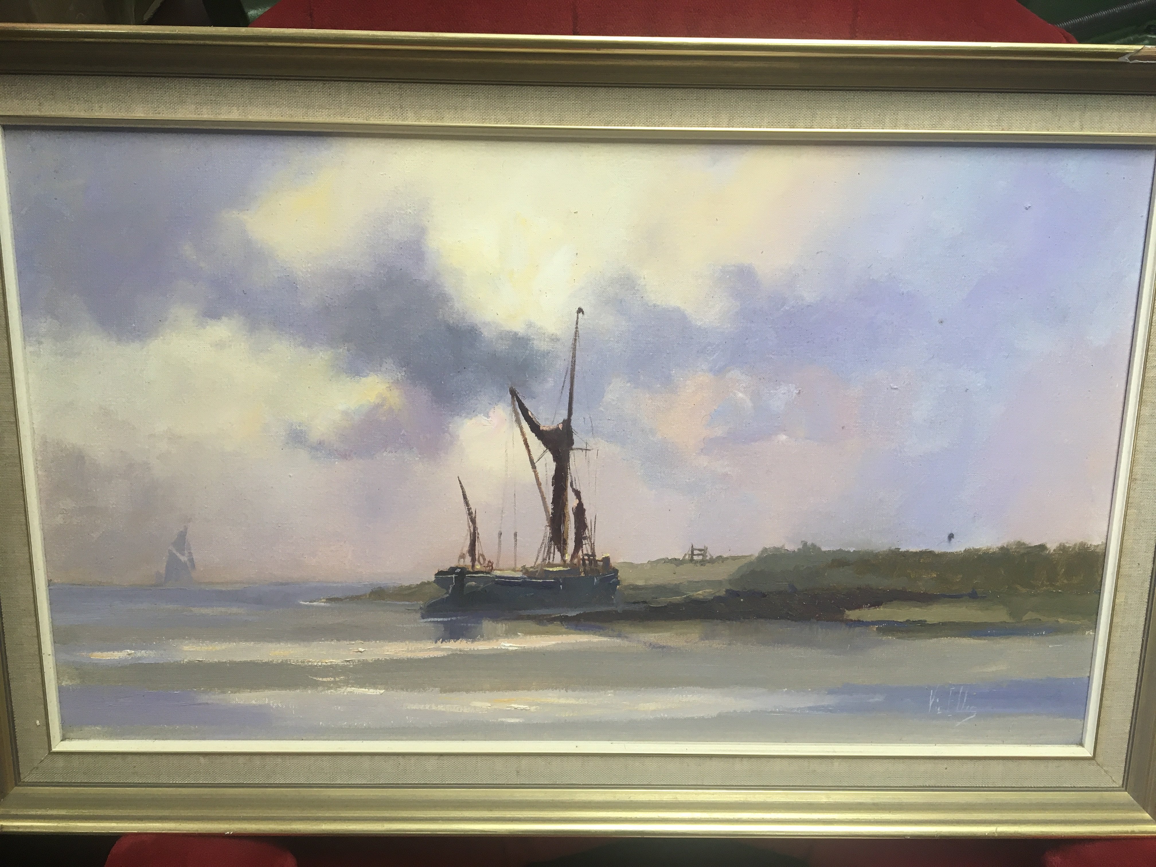 A framed Vic Ellis oil on board painting with a marine scene of sailing barge. 69x43cm