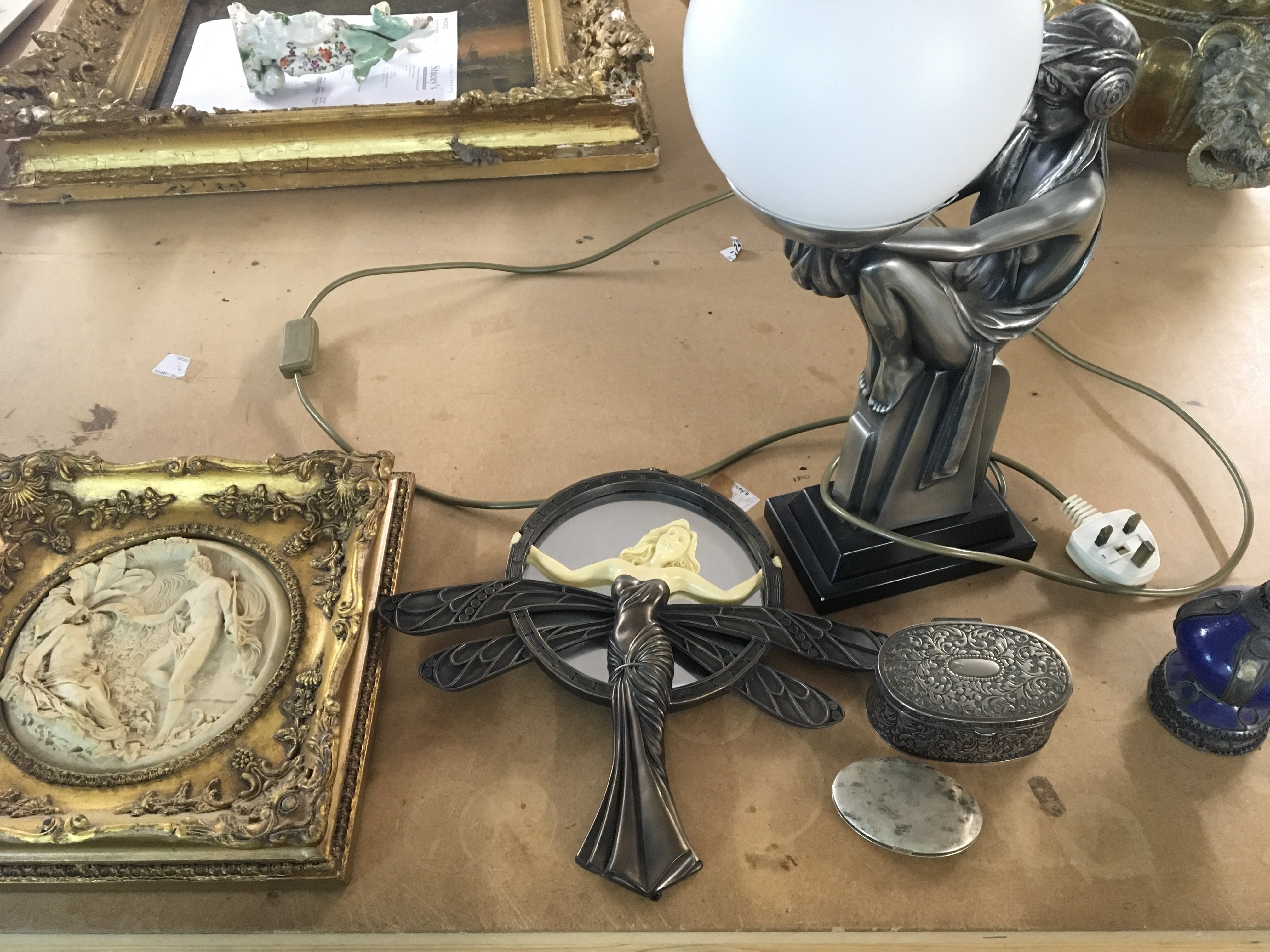 Three wood carved pictures in frames along with some Art Deco style items. Postage D