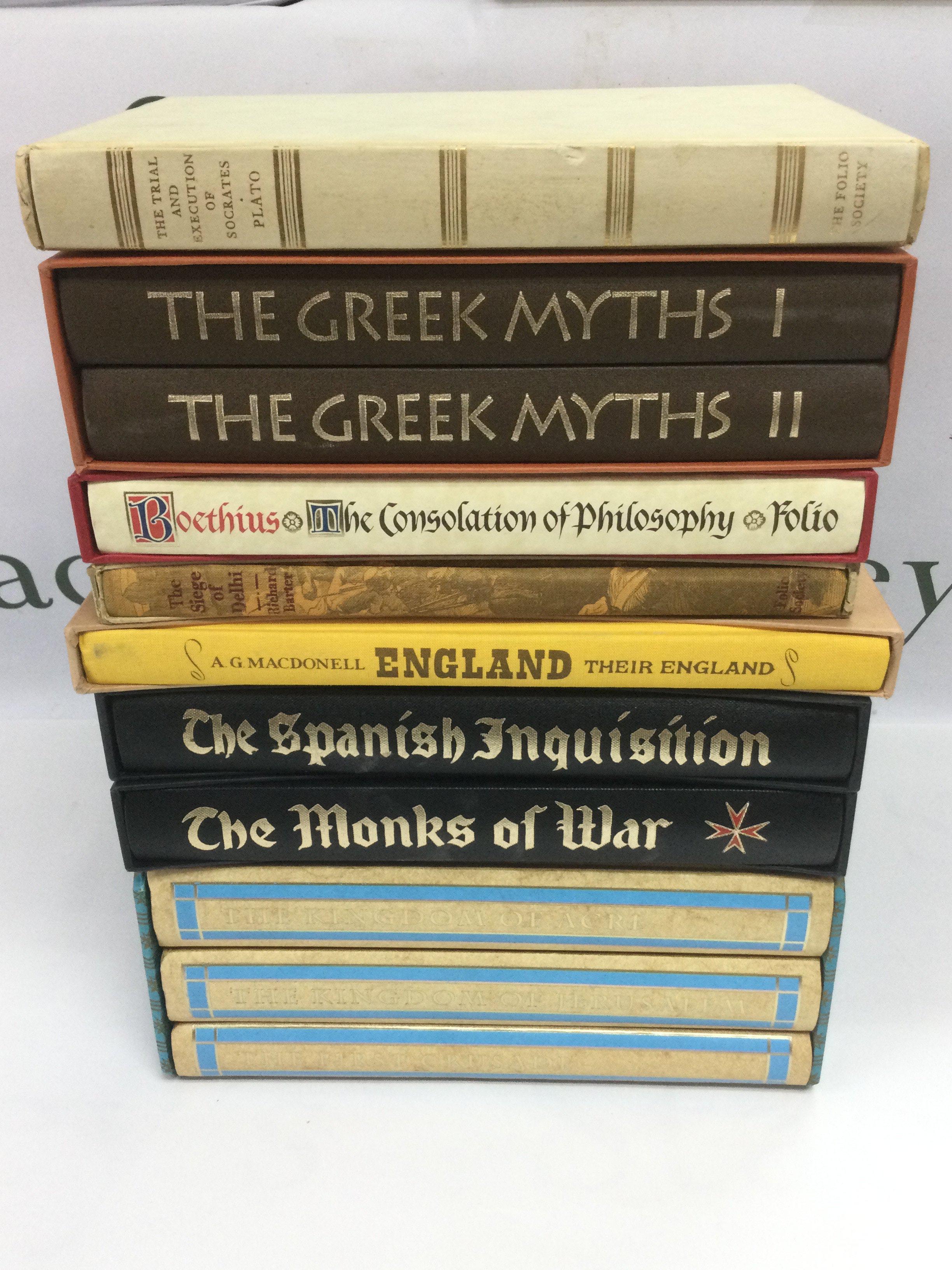 Seven Folio Society books of historical interest including a two volume set of The Greek Myths, The Trail And Execution Of Socrates and others. Shipping category D.