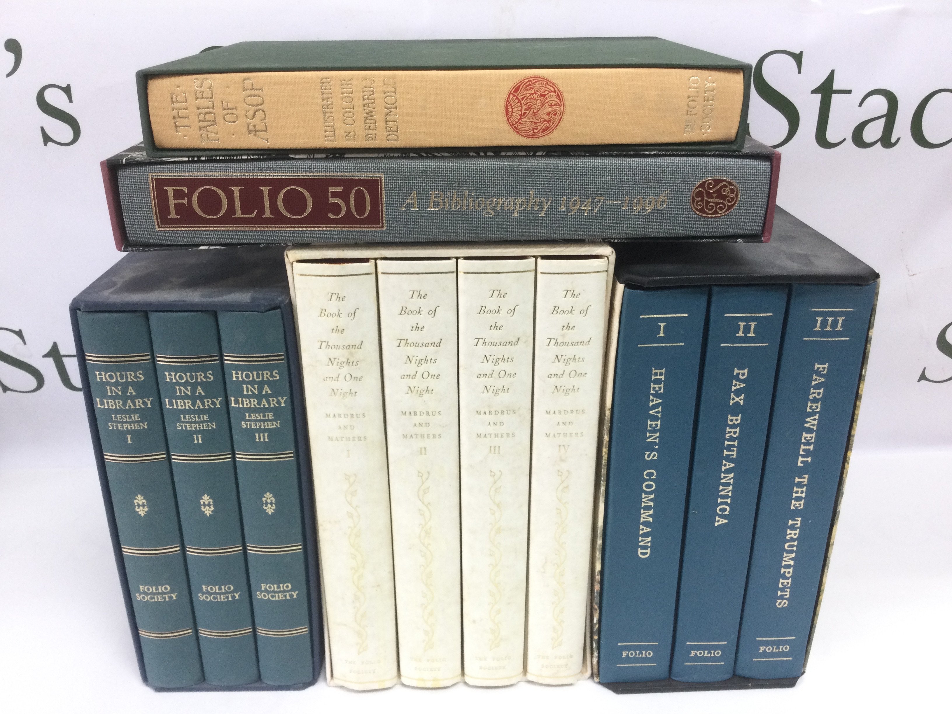 Five Folio Society books comprising a four volume set of The Book Of The Thousand Nights And One Night, The Fables Of Aesop, Hours In A Library and others. Shipping category D.