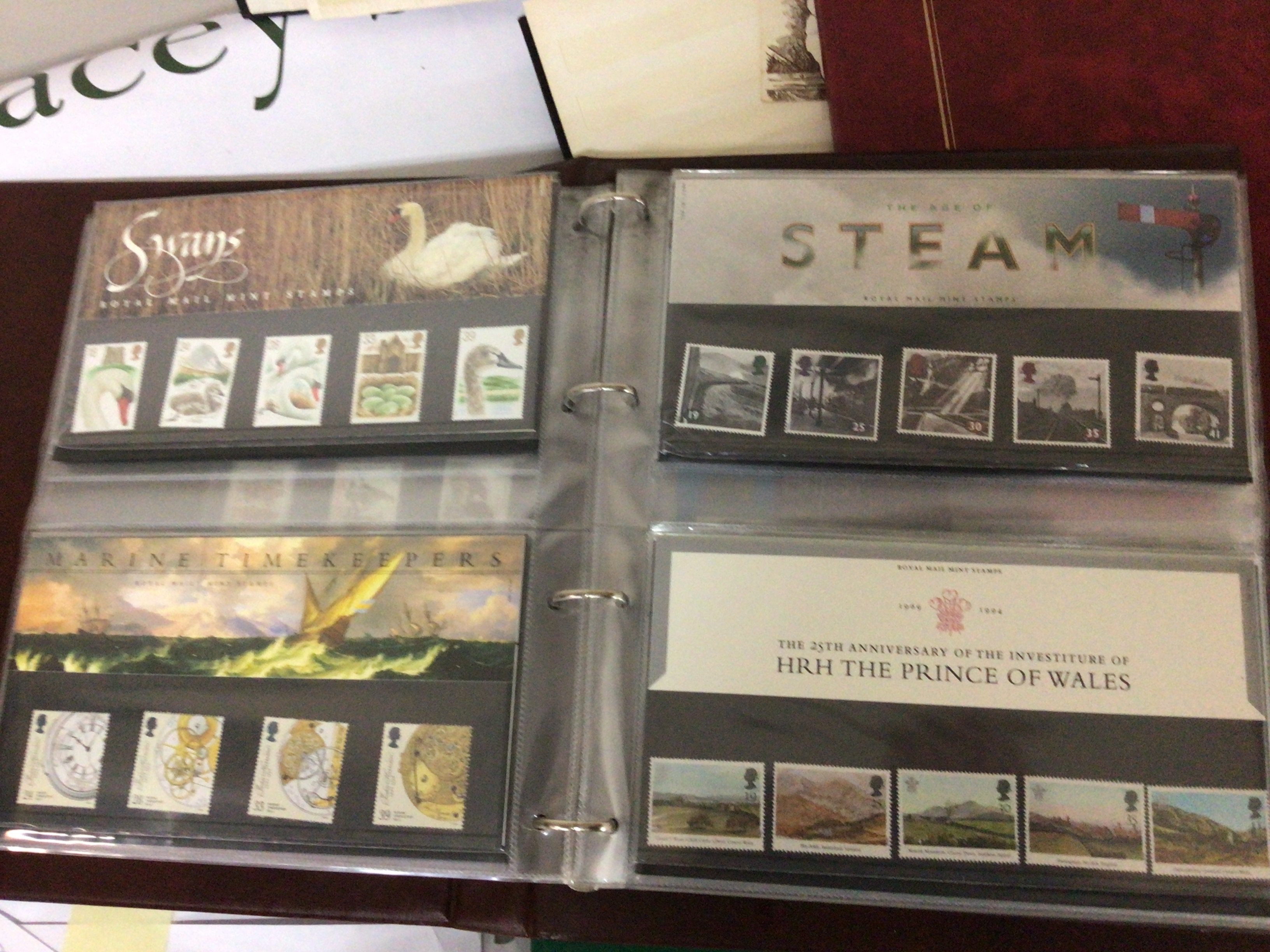 An album containing Royal Mail Year Packs 1991-2002 not complete an album of presentation packs and other stamp albums British and world stamps used and unused.