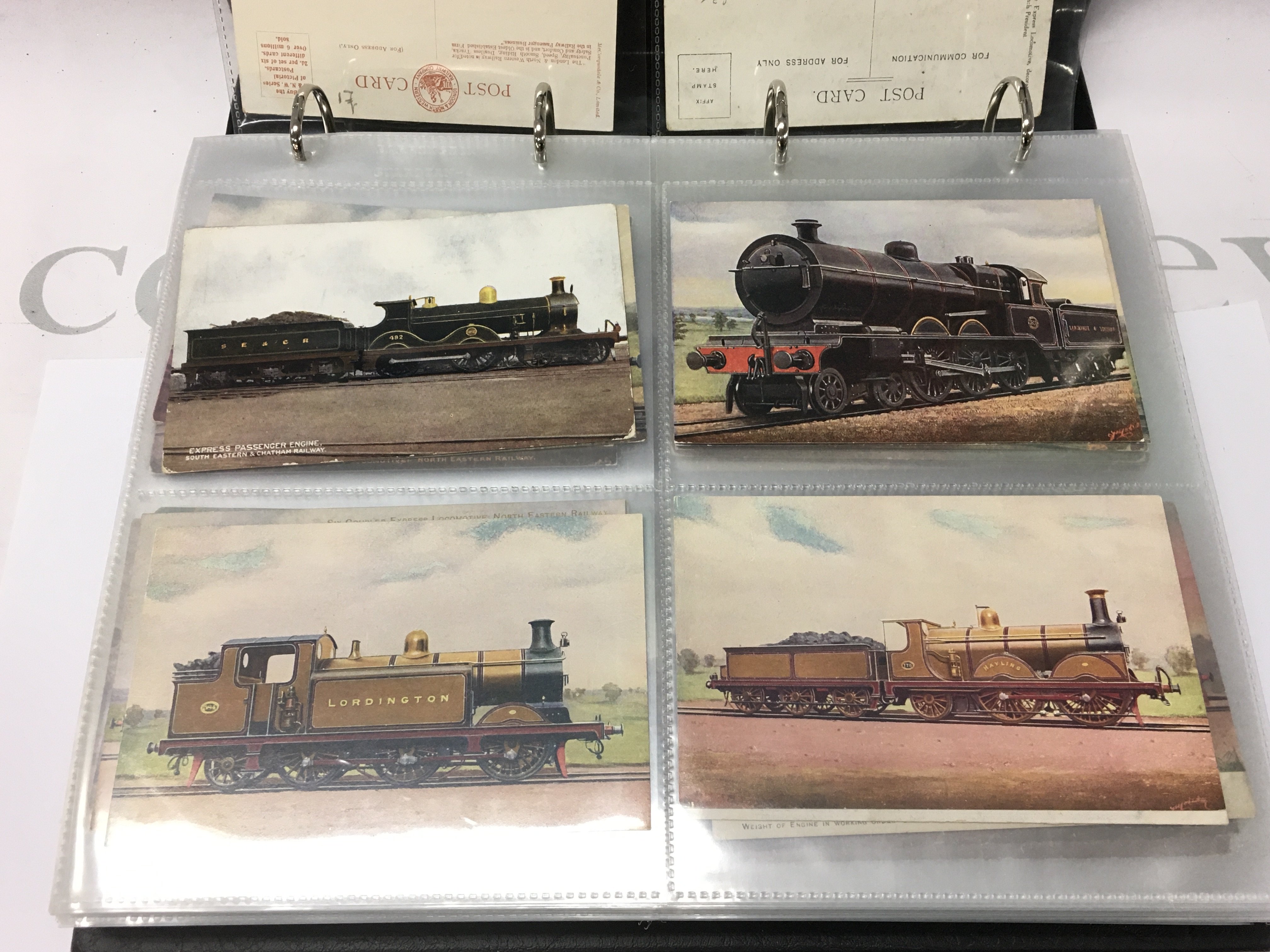 A large album of steam train post cards. Postage B