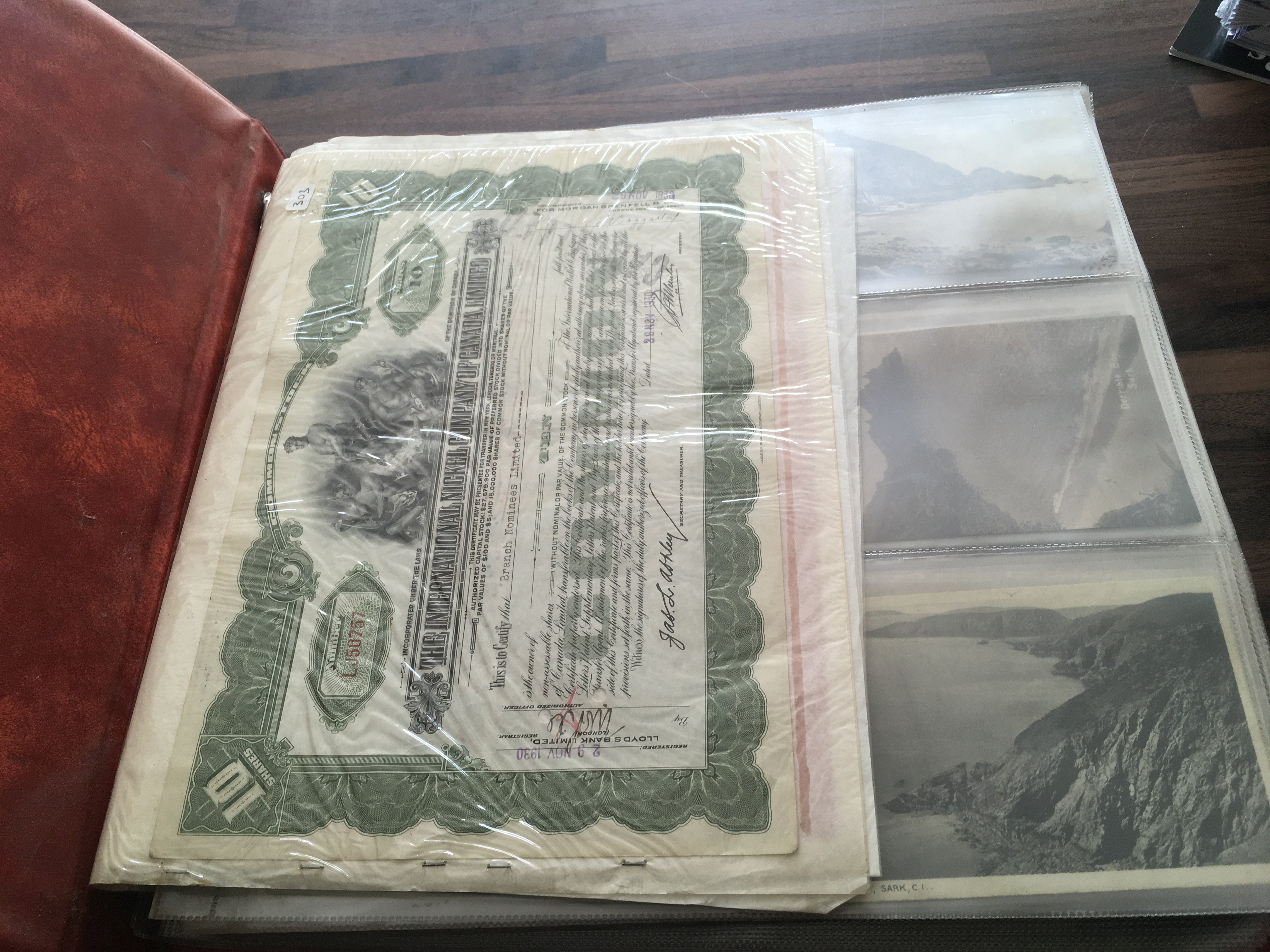 An album of vintage postcards including UK locations, foreign cards, Royal family cards etc. postage category C